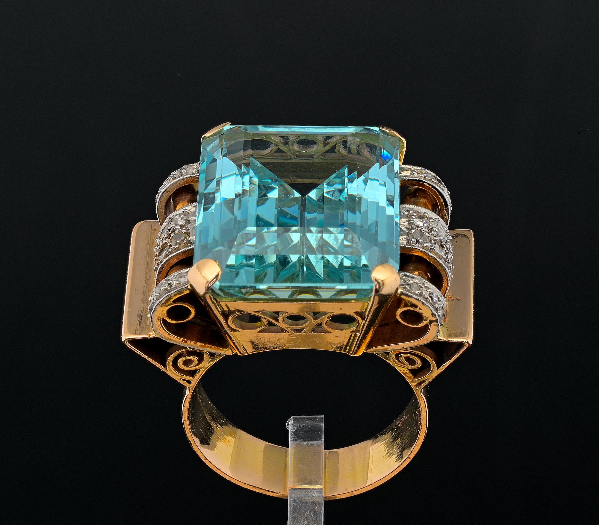 A Striking genuine Art Deco Aquamarine and Diamond ring 1935 circa, imposing mounting beautifully hand crafted during the time of solid 18 Kt gold, delightful underbridge work with steps aside creating dynamism and great character to the design
Set