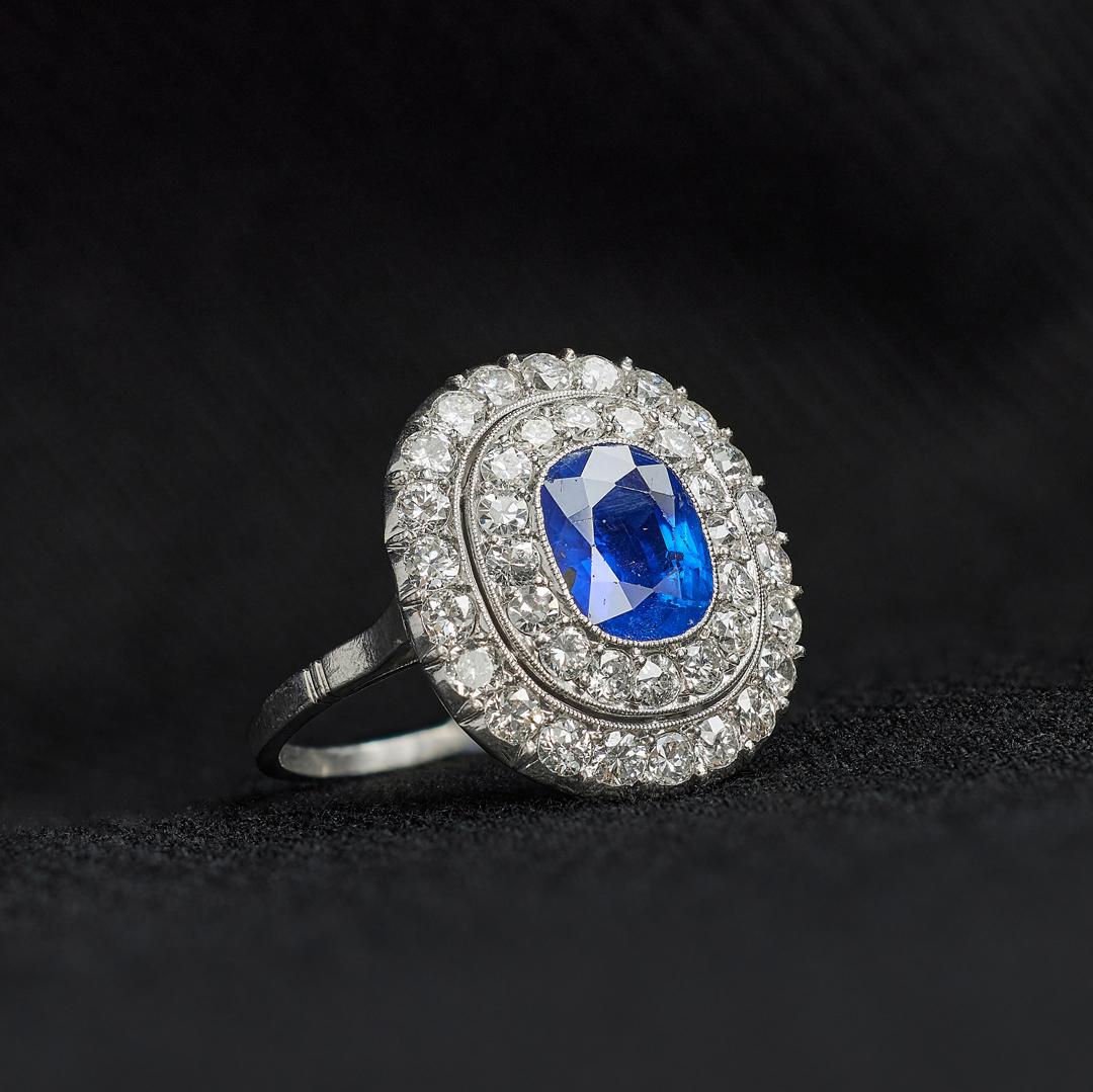 Women's or Men's Art Deco 2.20 Carat Burmese Sapphire and Diamond Double Halo Ring For Sale
