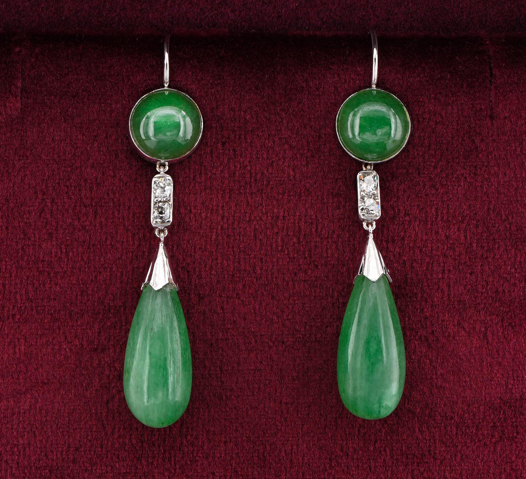 Rare Find
A good pair of authentic Art Deco earrings dating 1925 ca.
They have beautiful design simply made out by the Emeralds alone and Diamond link connecting top from bottom, hand made during the period of solid 18 KT white gold
They contain