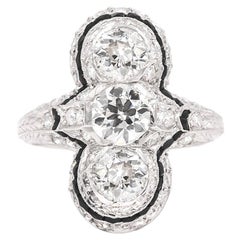 Art Deco 2.27 Carat Total Weight Old European Cut Diamond and Onyx 3-Stone Ring