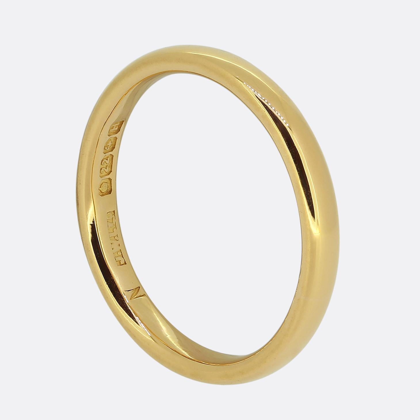 Here we have a smooth, polished and unembellished court shaped wedding band ring crafted from 22ct yellow gold and hallmarked to the year 1932.

Condition: Used (Very Good)
Weight: 3.8 grams
Size: M (53) - Resizable
Band Width: 2mm
Hallmarked:
