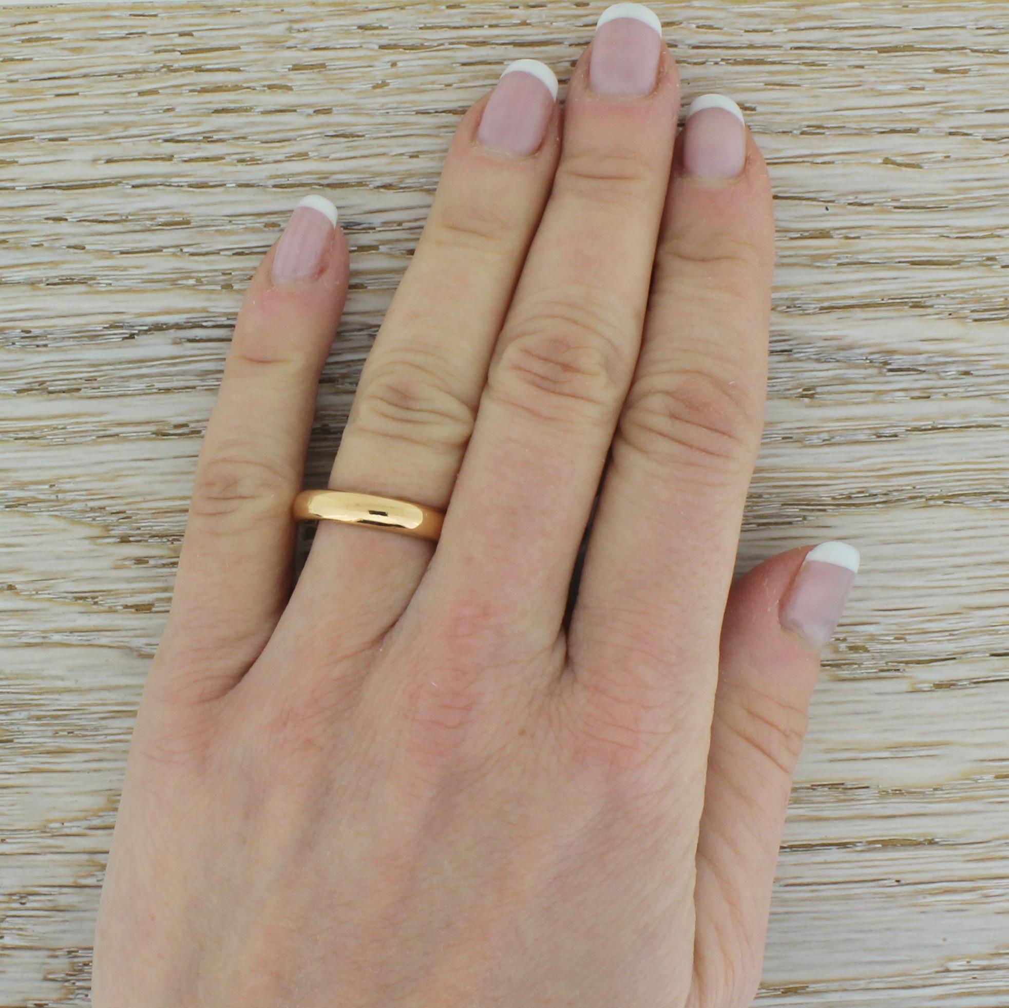 A stunning vintage rose gold wedding ring. A chunky, nicely heavy D-shaped 4mm band crafted in a warm rose gold. With clear internal hallmarks from the Birmingham Assay, 1929

Size – N 1/2 (UK) or 6.75 (US). Complimentary sizing is available, can go