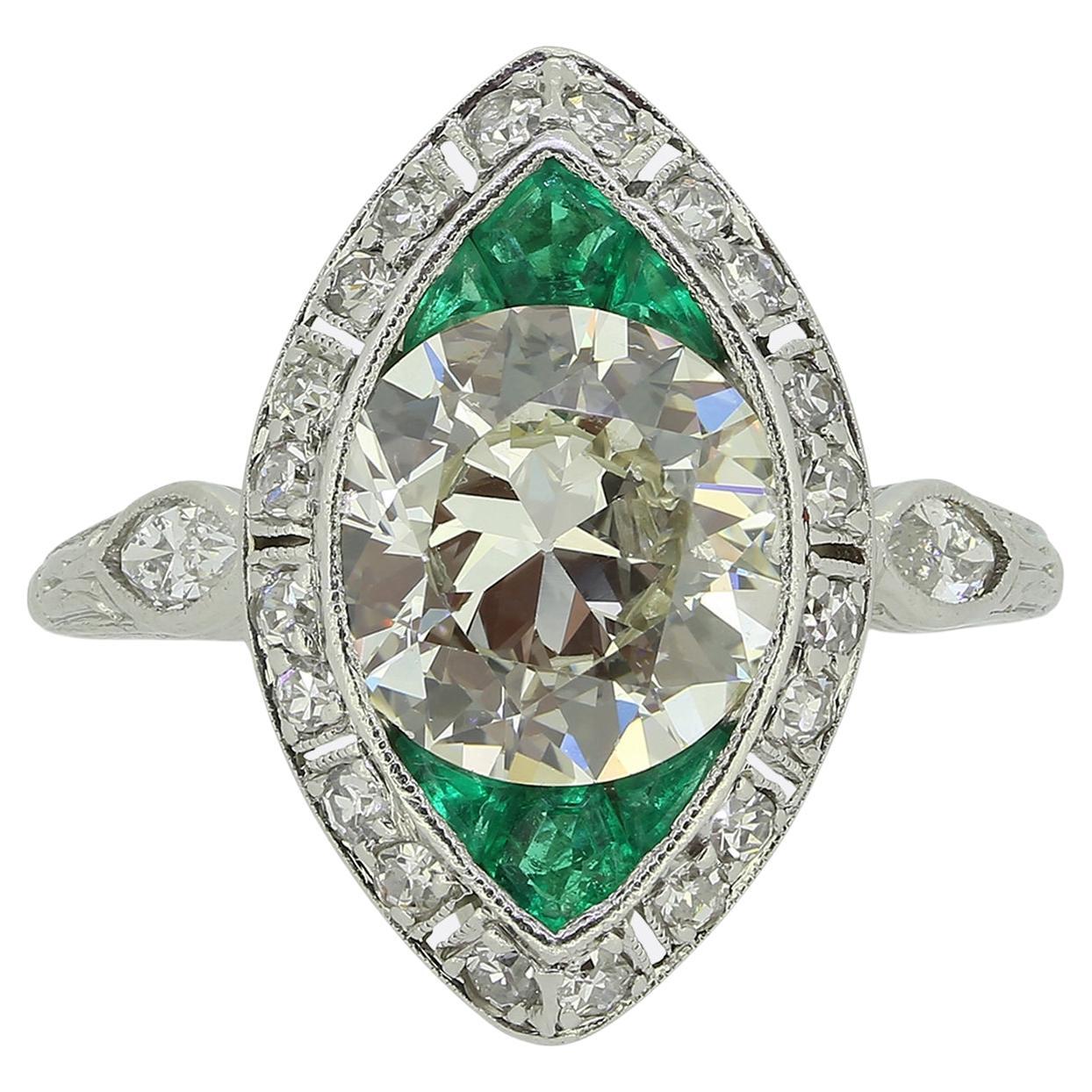 Art Deco 2.30 Carat Diamond and Emerald Navette Ring