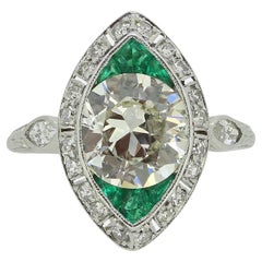 Antique Art Deco 2.30 Carat Diamond and Emerald Navette Ring