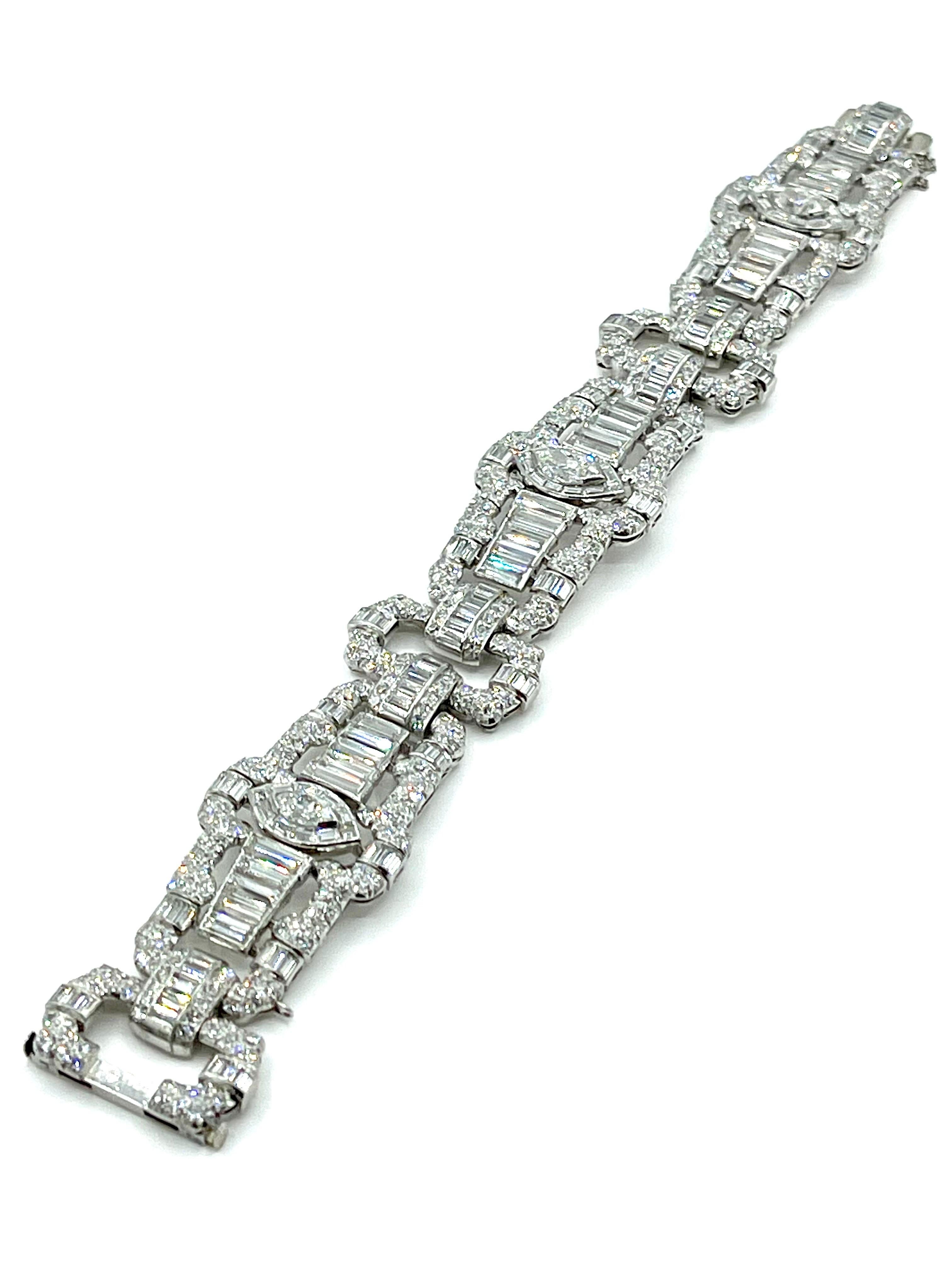 This is such a stunning Art Deco Diamond bracelet!  The bracelet contains 633 Diamonds, of round single cut, marquise, and baguettes, all set in platinum.  The Diamonds combine for a total weight of 23.00 carats, and graded as G-I color, VS1-SI1