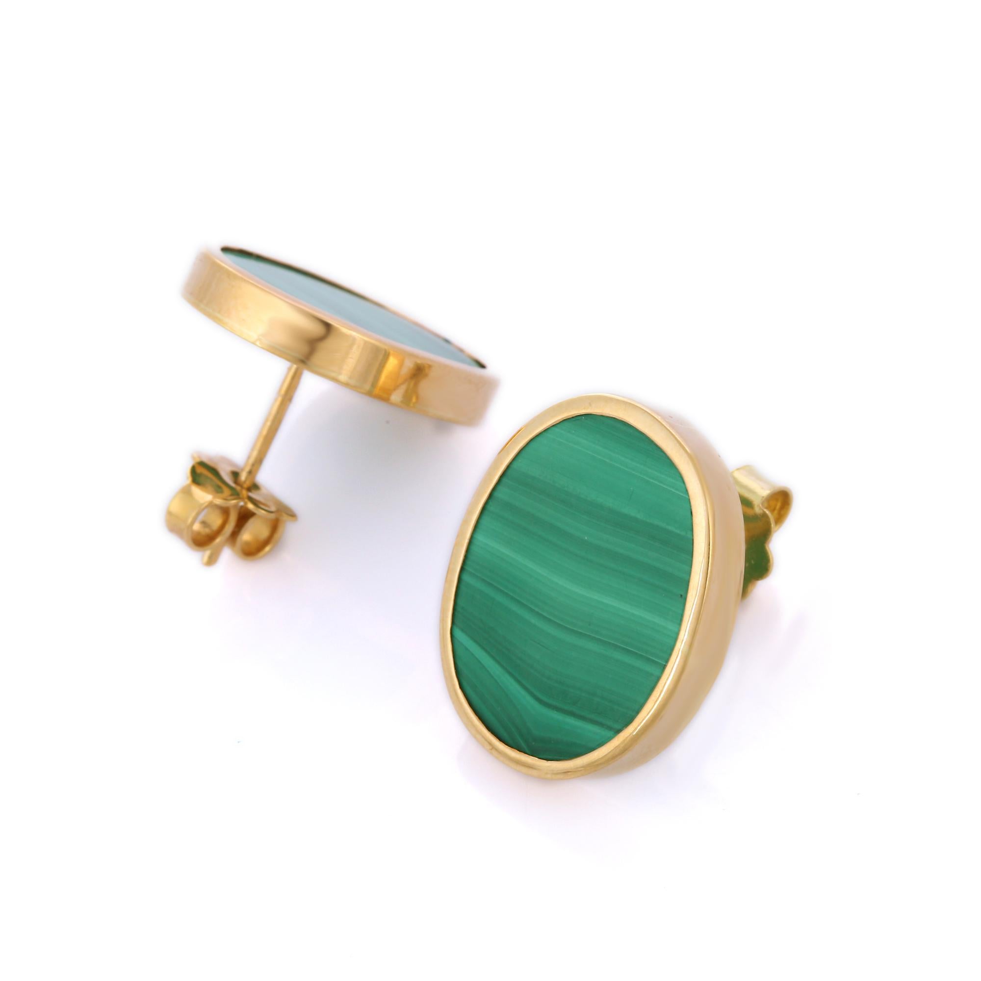 Studs create a subtle beauty while showcasing the colors of the natural precious gemstones.

Oval cut malachite studs in 18K gold. Embrace your look with these stunning pair of earrings suitable for any occasion to complete your outfit.

PRODUCT
