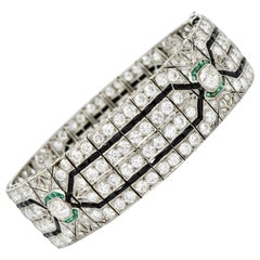 Art Deco 23.86 Carat Diamond Emerald Onyx Platinum Wide Decorous Bracelet