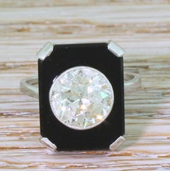 Art Deco 2.40 Carat Old Cut Diamond and Onyx 18 Karat White Gold Ring