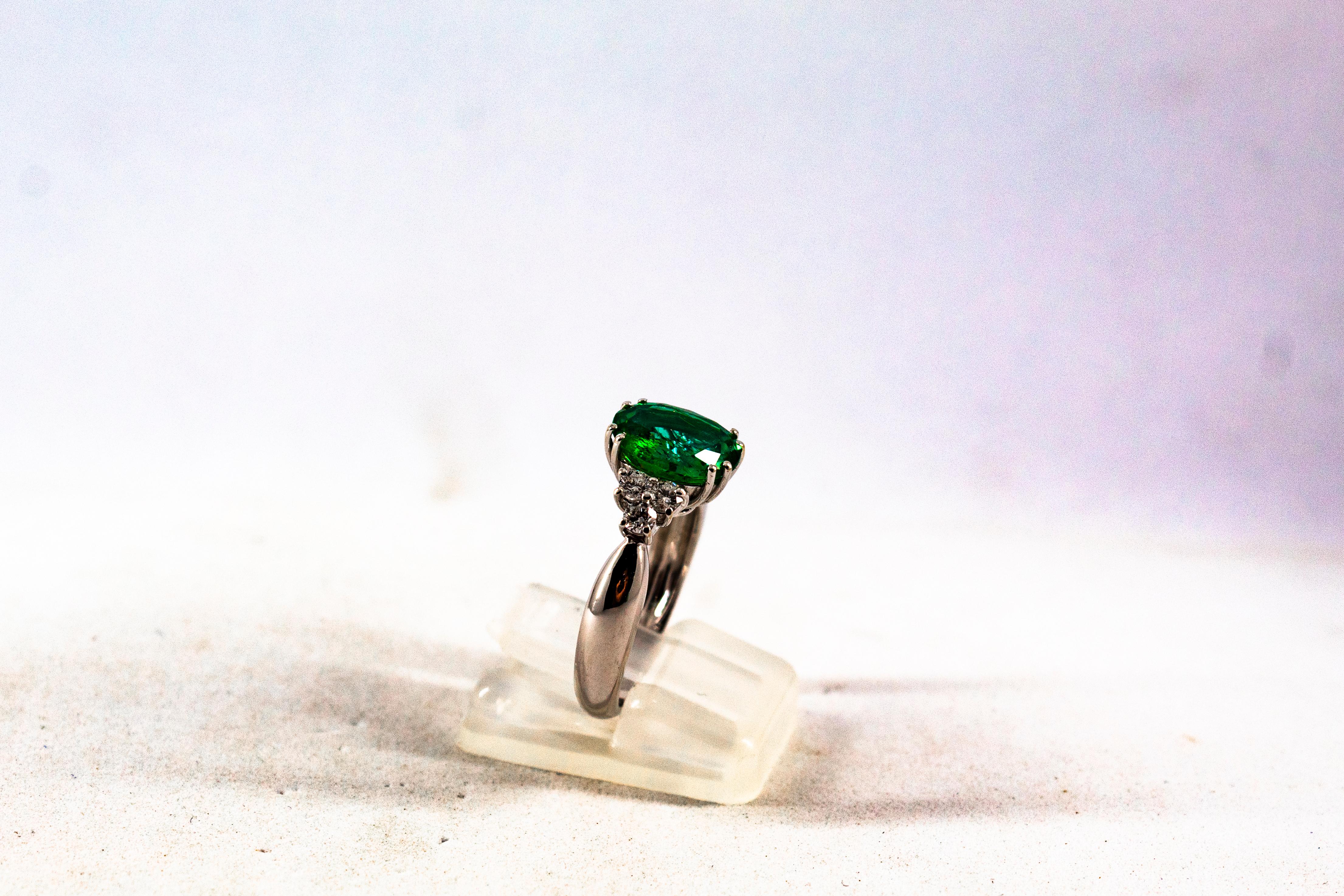 Women's or Men's Art Deco Style 2.43 Carat Emerald 0.35 Carat Diamond White Gold Cocktail Ring