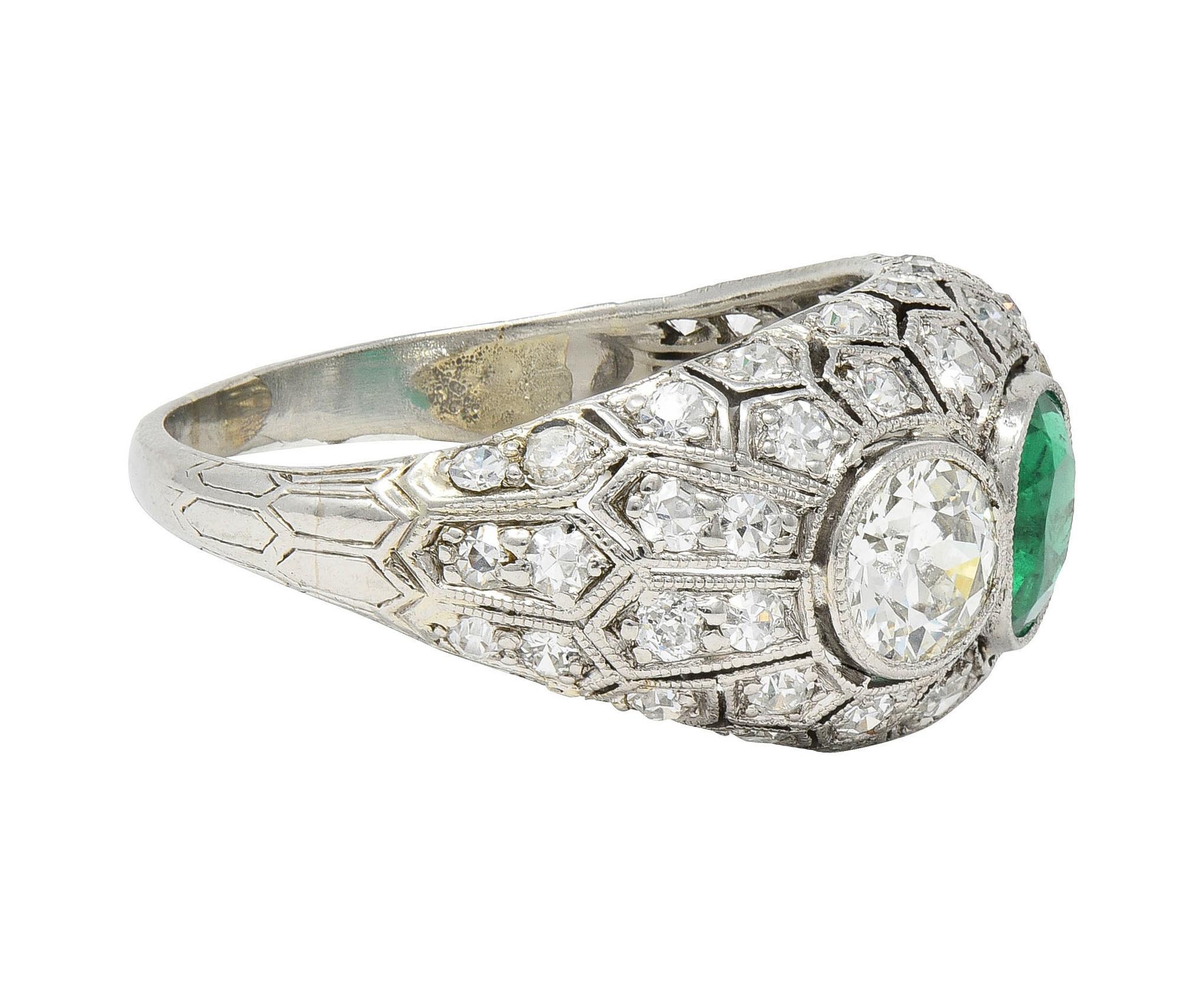Women's or Men's Art Deco 2.49 CTW Emerald Diamond Platinum Three Stone Antique Bombé Ring For Sale