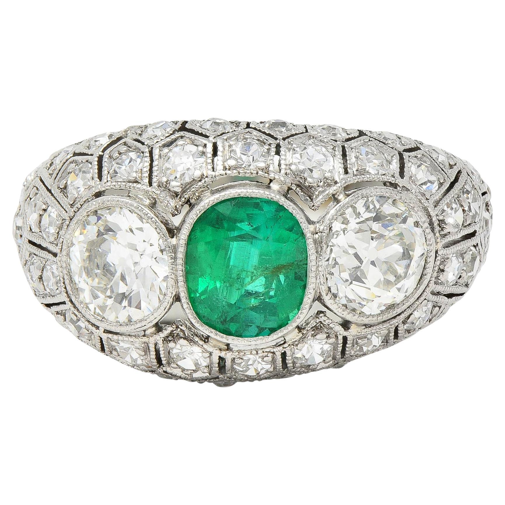 Art Deco 2.49 CTW Emerald Diamond Platinum Three Stone Antique Bombé Ring For Sale