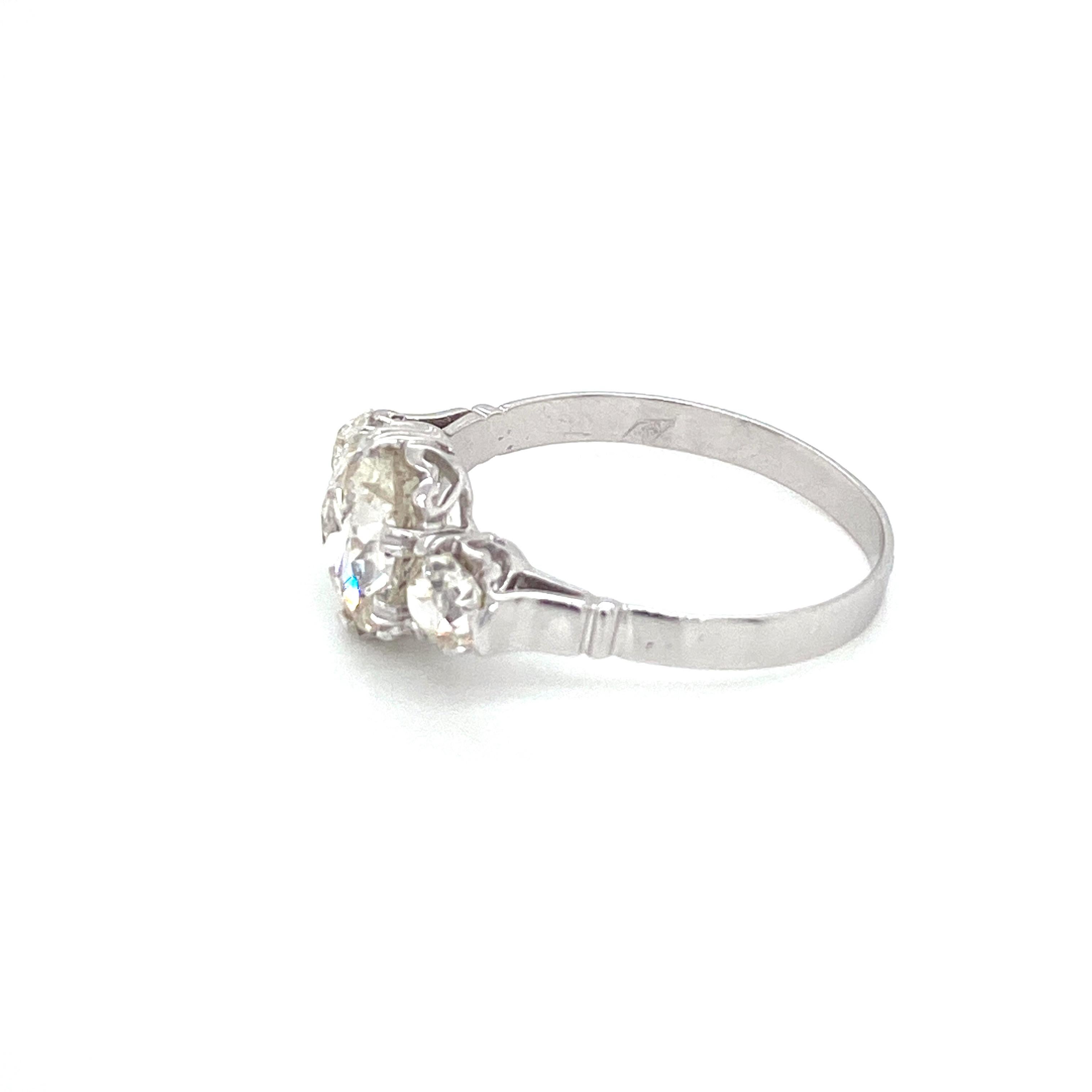 Art Deco 2.50 Carat Diamond Three-Stone Gold Ring 1