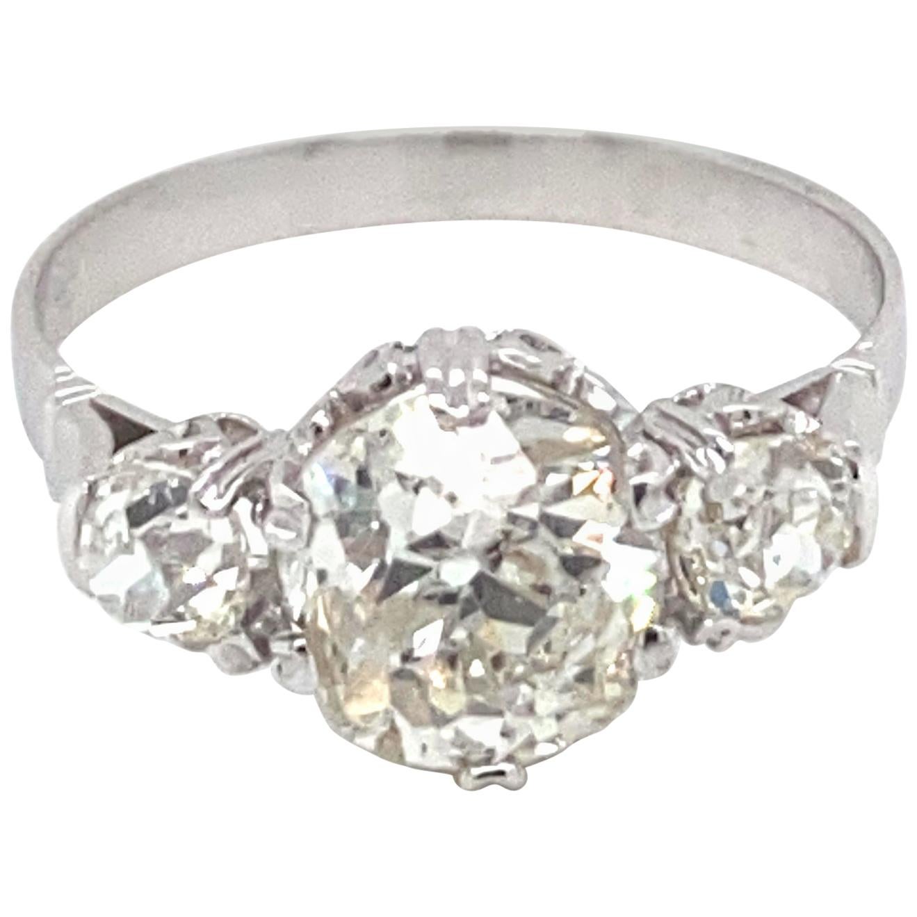 Art Deco 2.50 Carat Diamond Three-Stone Gold Ring