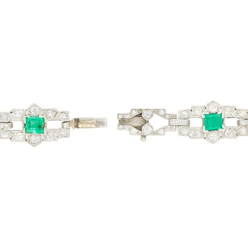 Iconically Art Deco in it’s design, this stunning bracelet was hand crafted in the 1920s. The design centres around five baguette cut emeralds spread across its length. The largest sits in the centre at 1.00 carat, the flanking pair are 0.50 carat