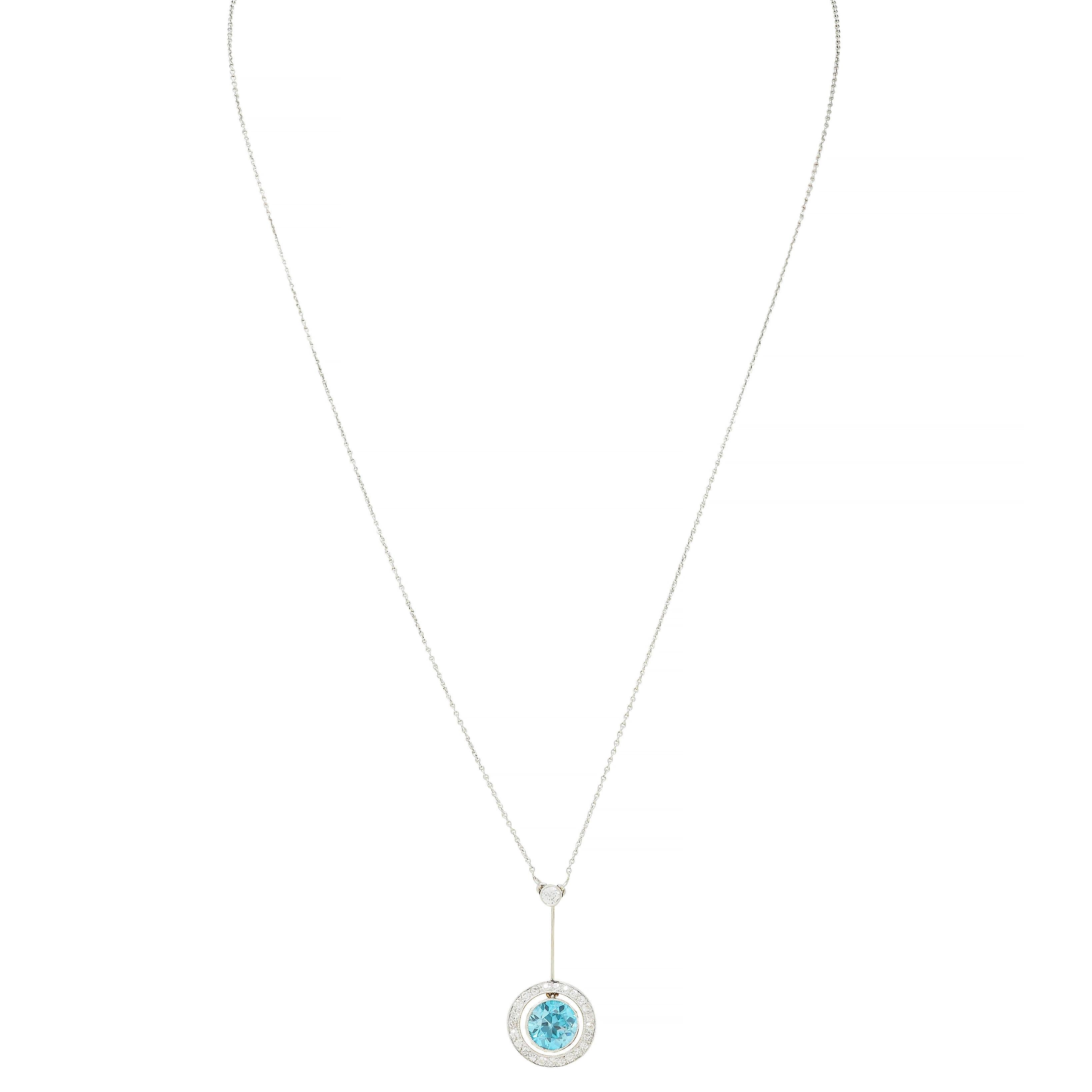 Comprised of a 0.5 mm platinum cable link chain suspending an articulating drop pendant
Featuring a round cut zircon weighing approximately 2.20. carats
Transparent, well-saturated medium vibrant blue - bezel set
Articulating in the center of a