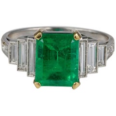 Art Deco 2.60 Carat Colombian Emerald 1.70 Carat Diamond Platinum Ring