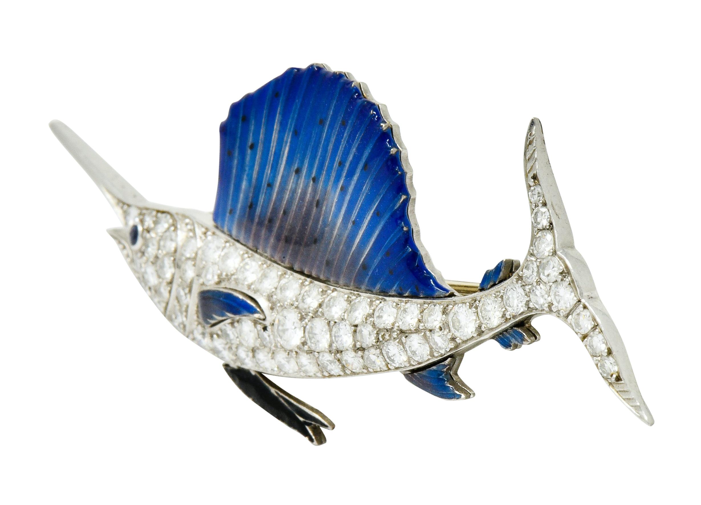 Brooch designed as a swordfish with a bowed body, open mouth, and sapphire eye accent

Set throughout by single cut and round brilliant cut diamonds weighing in total approximately 2.60 carats, G to I color with VS clarity

Quality is consistent