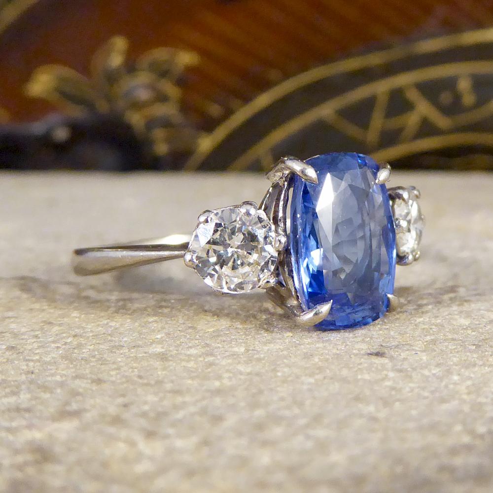 Featuring a 2.60ct Ceylon Sapphire with a wonderful light blue colour and two Round Brilliant Cut Diamonds weighing 0.75ct in total, this ring is stunning and truly does stand the test of time. It was hand crafted from 18ct White Gold in the Art