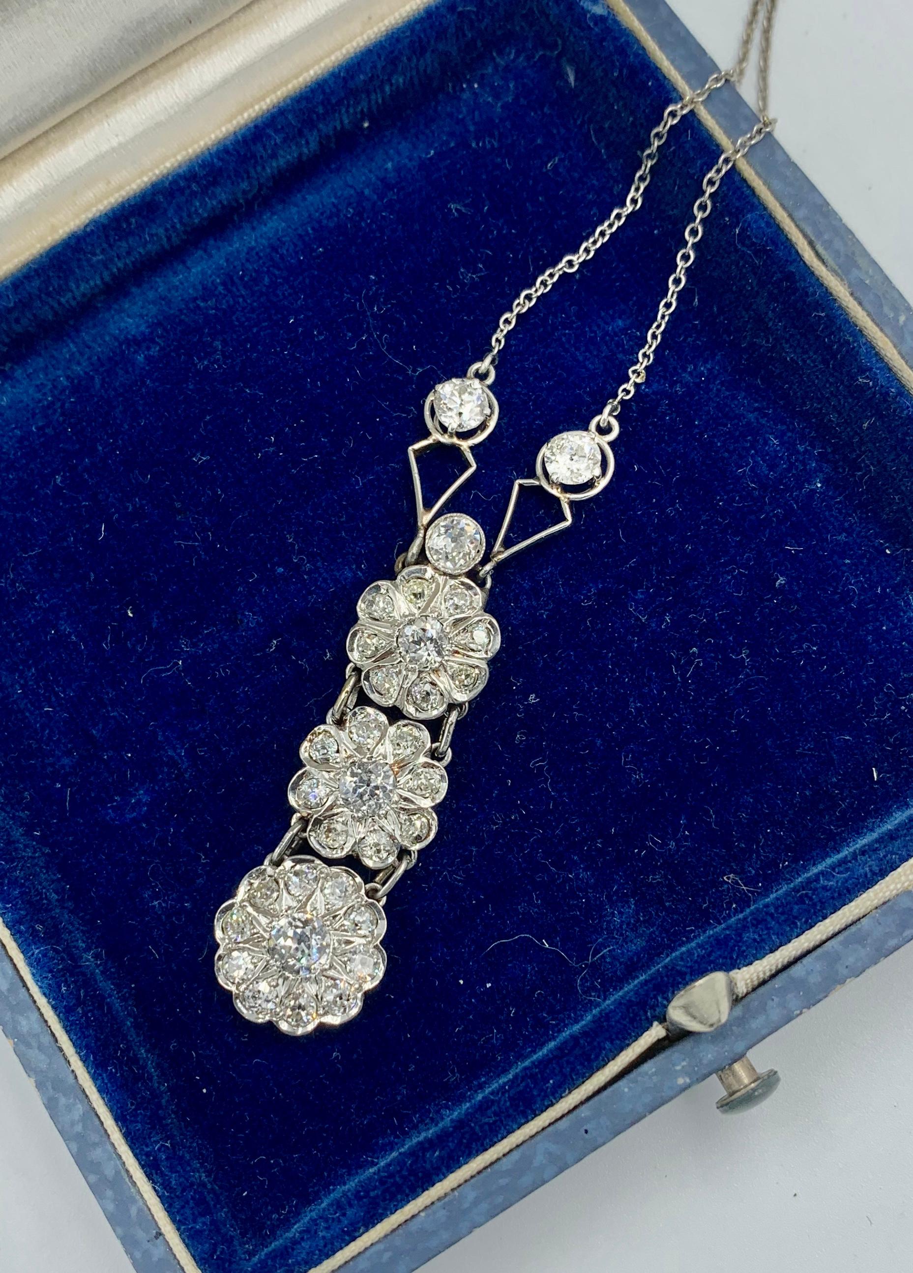 A stunning antique Art Deco - Victorian - Edwardian Platinum Diamond Lavaliere Pendant Necklace with 32 sparkling white Old European Cut Diamonds of great beauty in a gorgeous platinum setting.  This original Art Deco pendant necklace contains 2.7