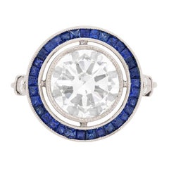 Bague Art déco en halo de diamants et saphirs de 2,81 carats, c. 1930