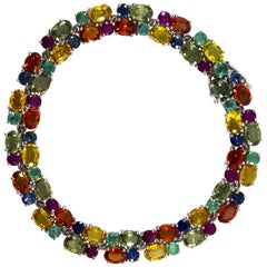 Art Deco 29.00 Carat Blue Yellow Green Sapphire Emerald Ruby White Gold Bracelet