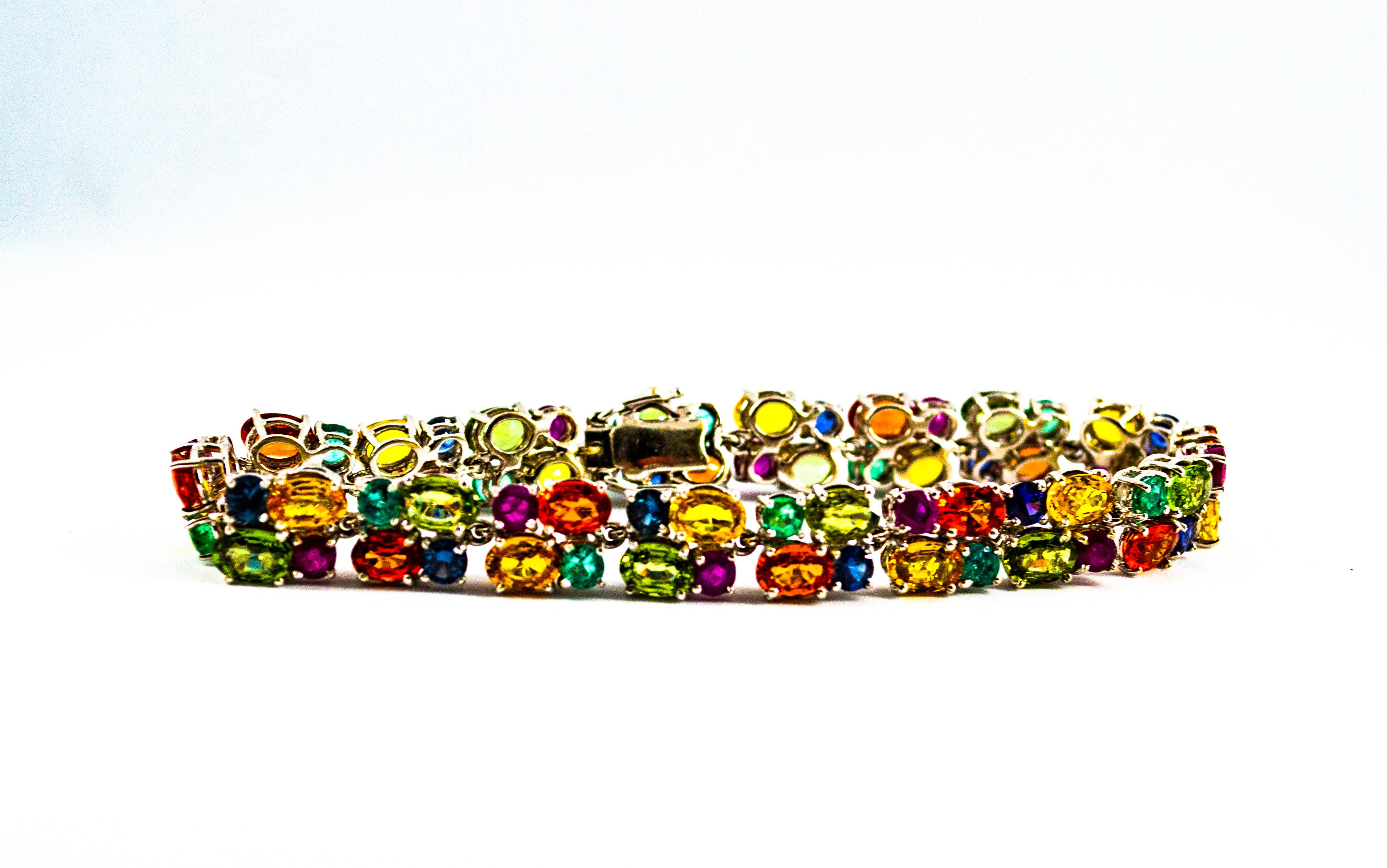 Art Deco Style 29.00 Carat Emerald Ruby Blue Yellow Green Sapphire Gold Bracelet In New Condition In Naples, IT