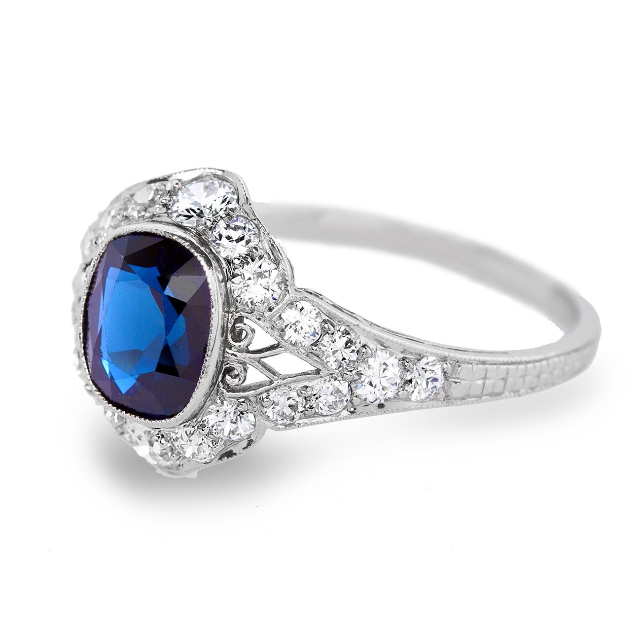 This Delightful Art Deco sapphire and diamond ring is set in platinum with a deep royal blue no heat sapphire weighing approx. 3 carat. surrounded with high white clean old mine brilliant diamonds.
This beautiful royal blue sapphire exhibits a