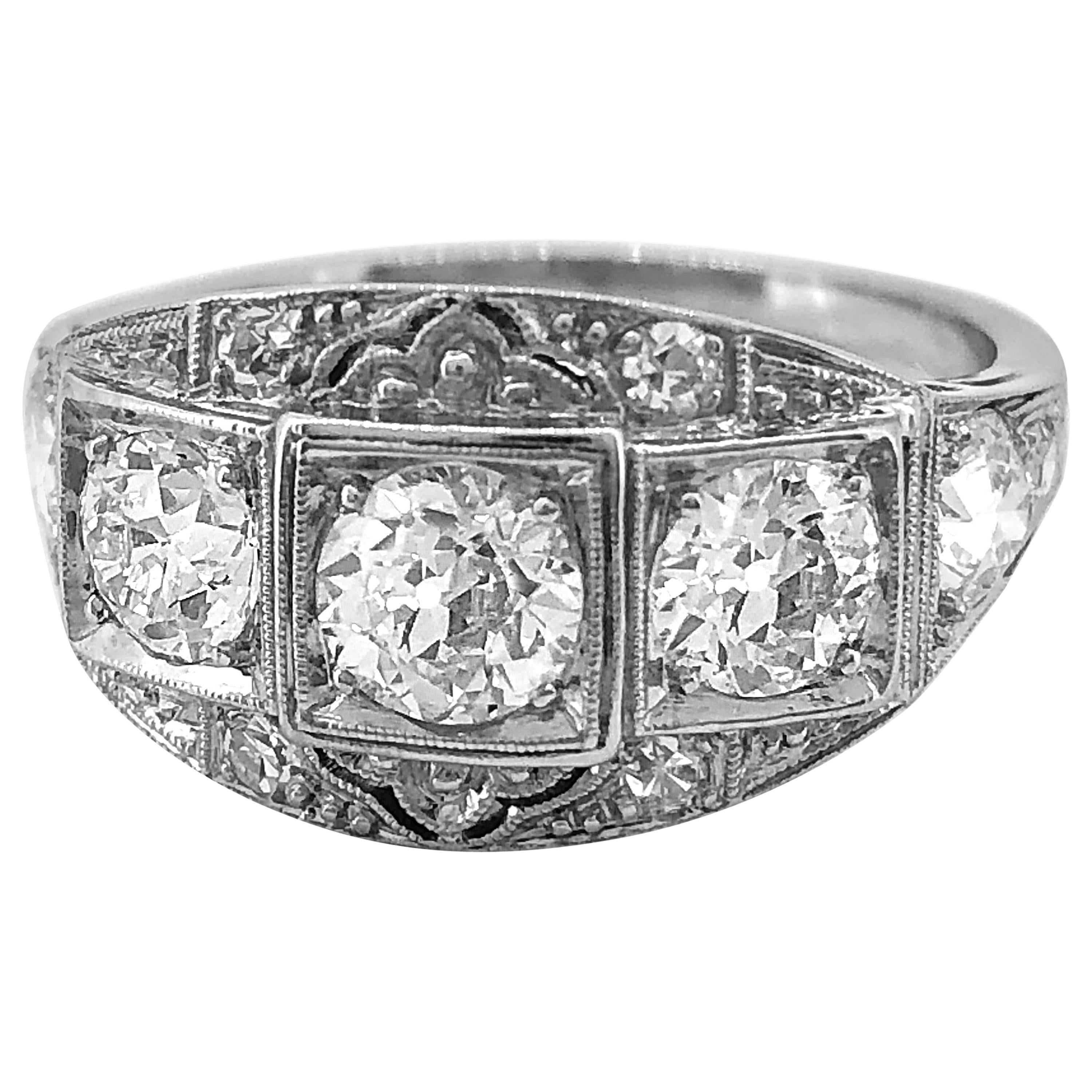 Art Deco 3-Stone Antique Engagement Ring 1.45 Carat T.W. Diamond Platinum