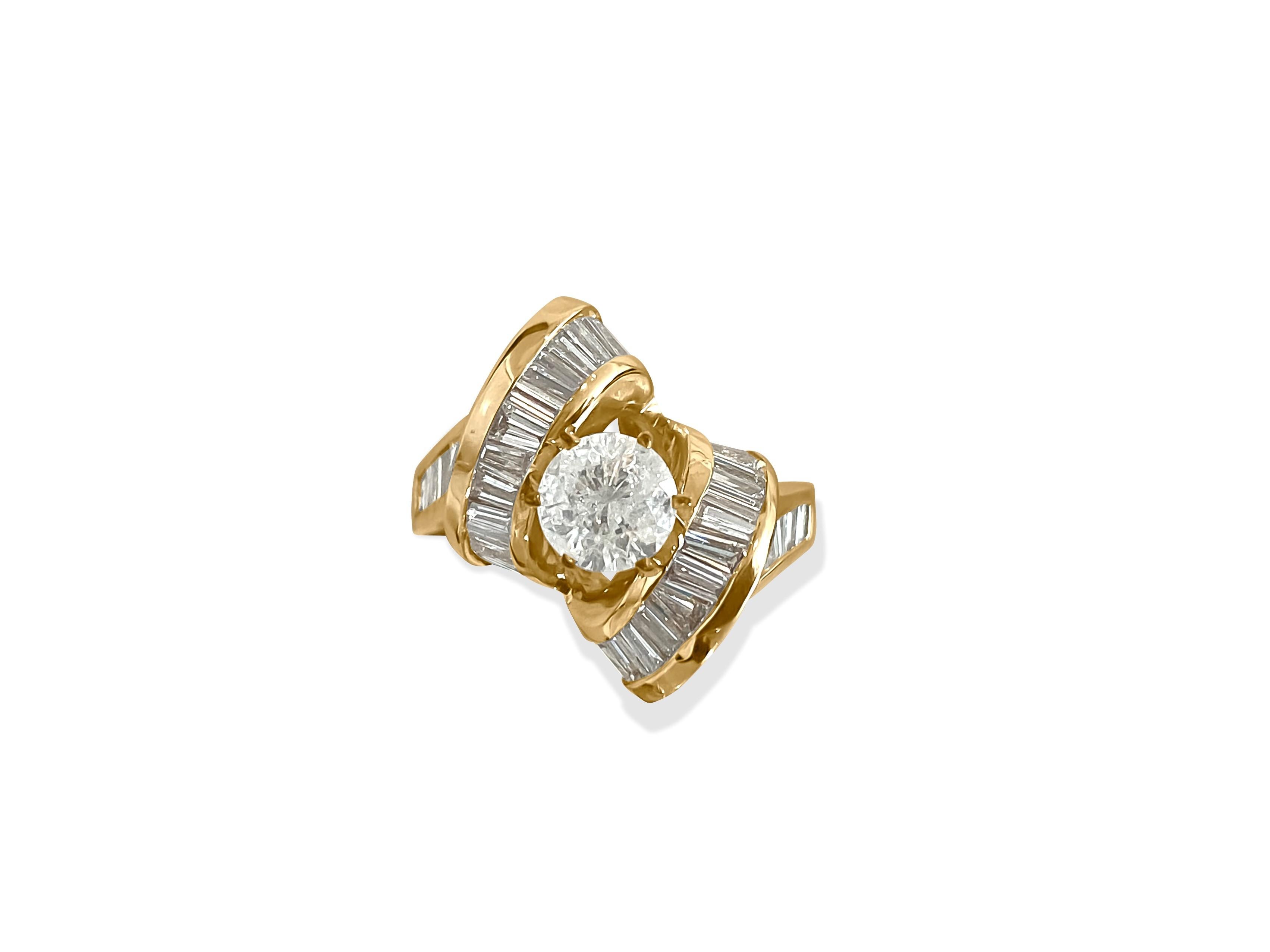 This vintage-style art deco ring features a stunning combination of diamonds set in 14K yellow gold. The centerpiece is a dazzling 1.00 carat round brilliant cut diamond with G color and I2-I3 clarity, complemented by 2.00 carats of baguette-cut