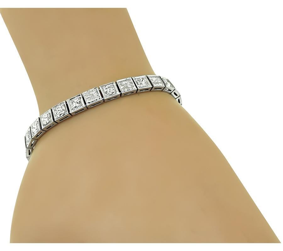 This is an elegant platinum line bracelet from the Art Deco era. The bracelet is set with sparkling old European cut diamonds that weigh approximately 3.00ct. The color of these diamonds is E with VS clarity. The bracelet measures 5mm in width and 7