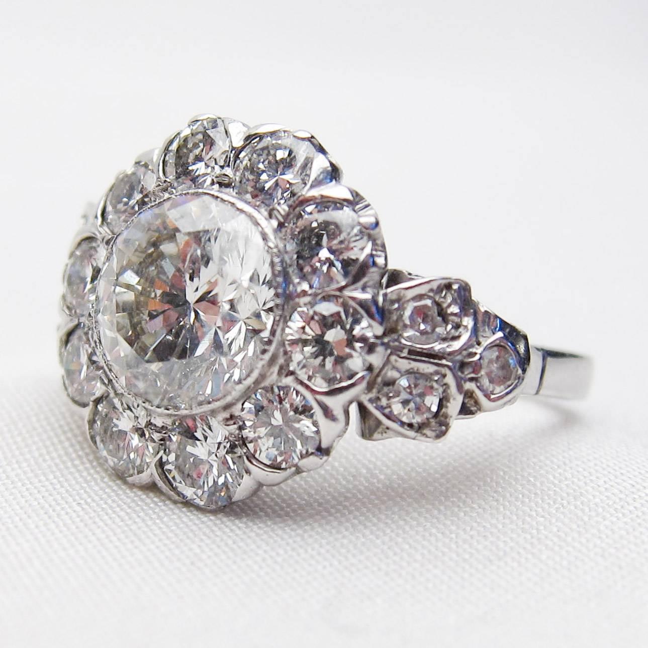 Art Deco 3.19 Carat Diamond 18 Karat White Gold Halo Engagement Ring For Sale 1