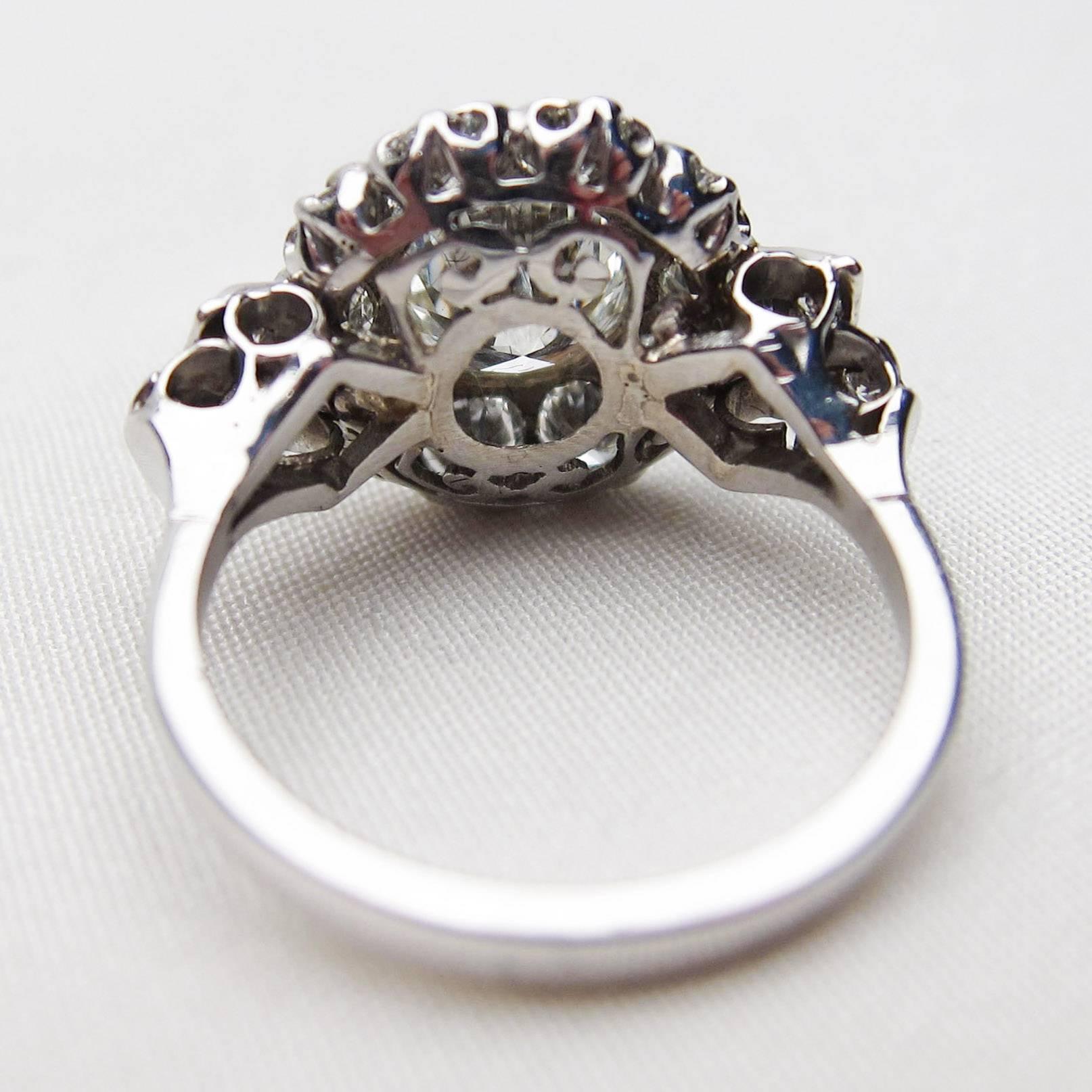 Art Deco 3.19 Carat Diamond 18 Karat White Gold Halo Engagement Ring For Sale 3
