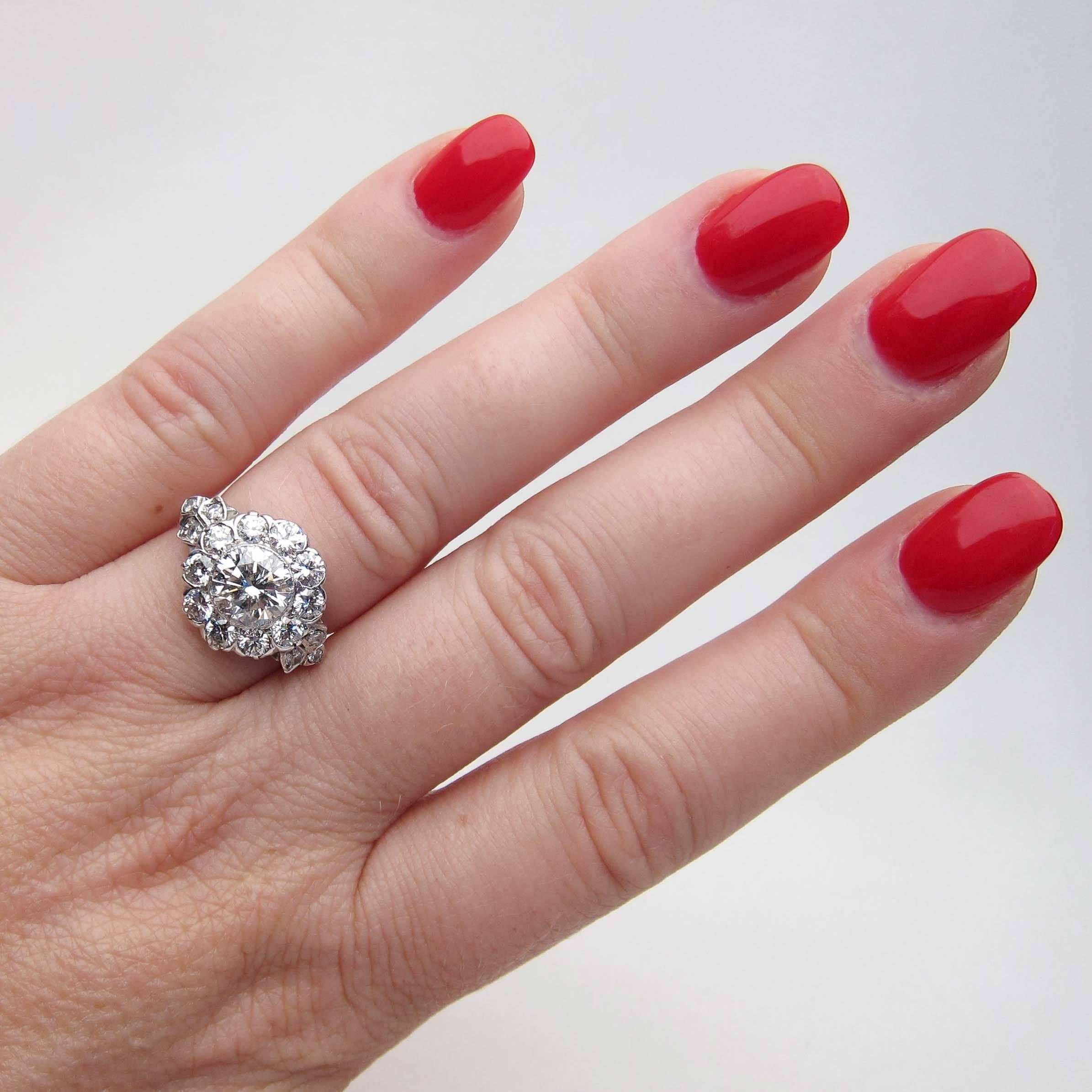 Art Deco 3.19 Carat Diamond 18 Karat White Gold Halo Engagement Ring For Sale 4