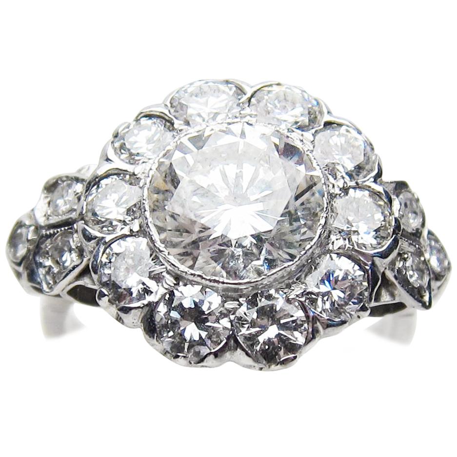 Art Deco 3.19 Carat Diamond 18 Karat White Gold Halo Engagement Ring For Sale