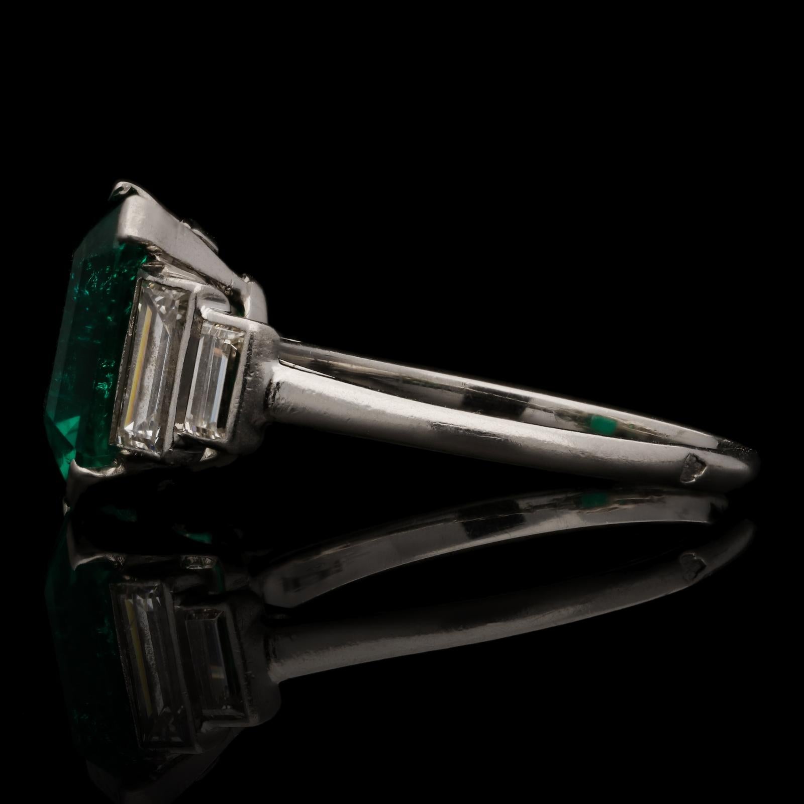 emerald ring with baguettes