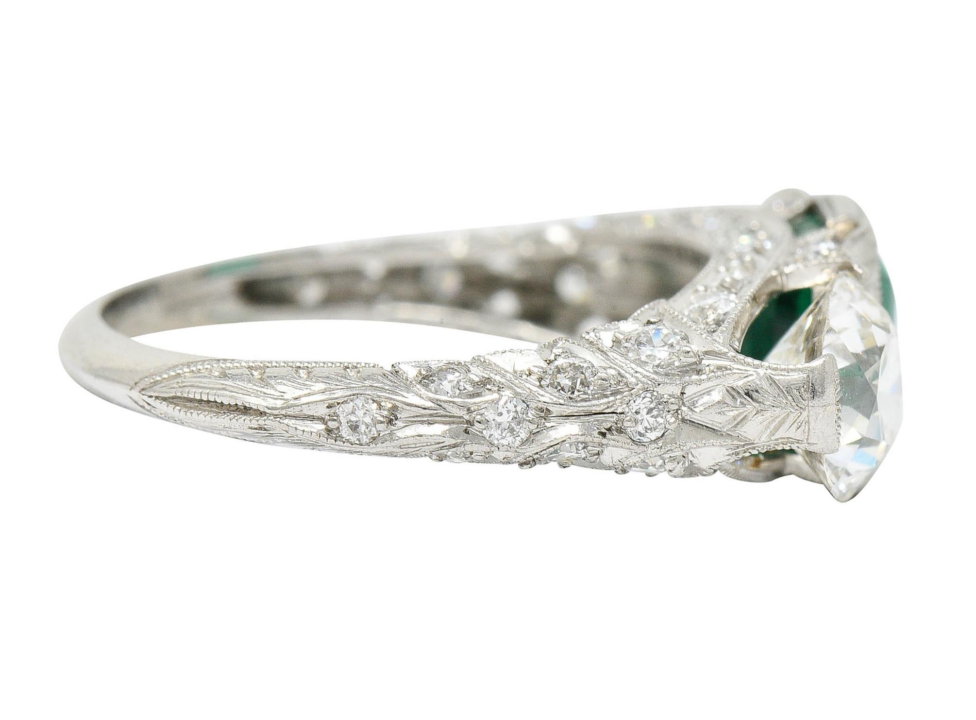 Art Deco 3.30 Carats Diamond Emerald Platinum Three Stone Ring In Excellent Condition In Philadelphia, PA