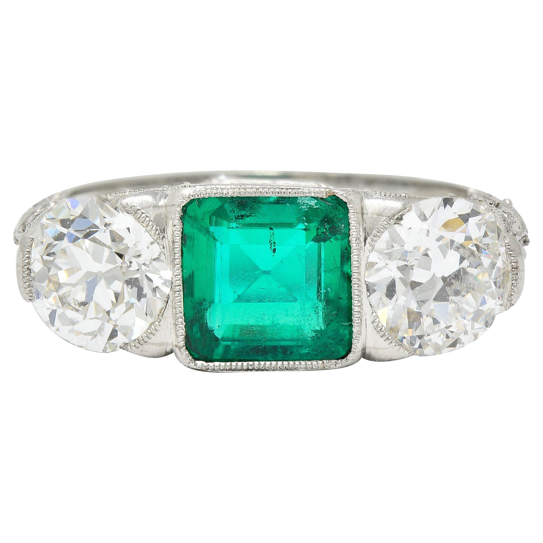 Art Deco 3.30 Carats Diamond Emerald Platinum Three Stone Ring