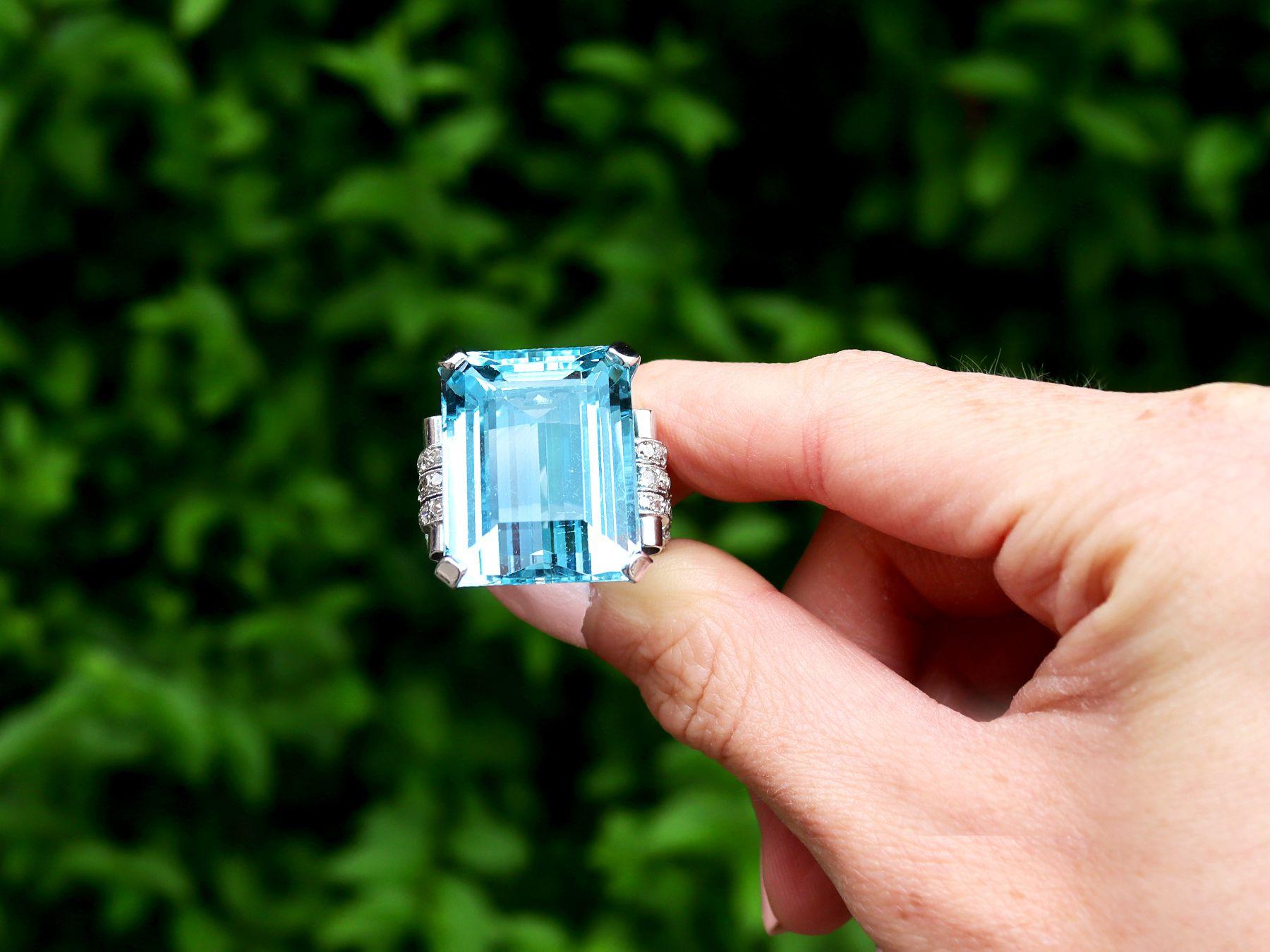 A stunning and large Art Deco 34.22 carat aquamarine and 1.28 carat diamond, 15 karat white gold and platinum set cocktail ring; part of our diverse vintage jewellery collections

This stunning, fine and impressive vintage aquamarine and diamond