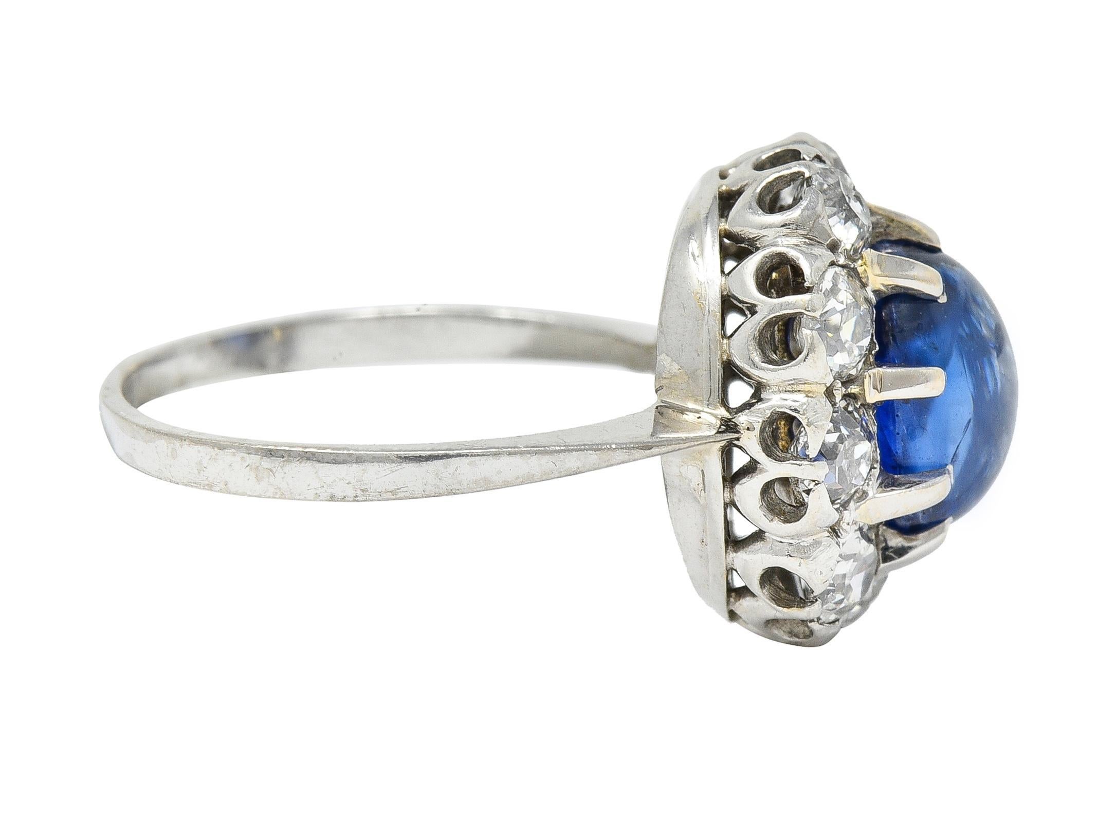Art Deco 3.52 CTW Sapphire Cabochon Diamond 18 Karat White Gold Halo Ring In Excellent Condition For Sale In Philadelphia, PA