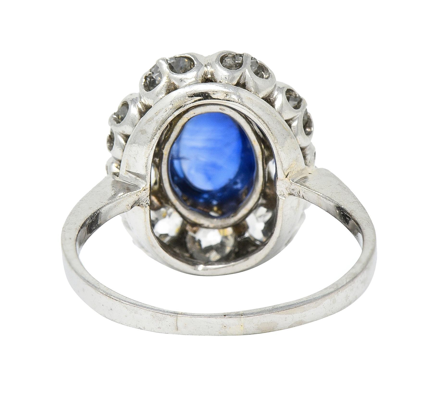 Women's or Men's Art Deco 3.52 CTW Sapphire Cabochon Diamond 18 Karat White Gold Halo Ring For Sale