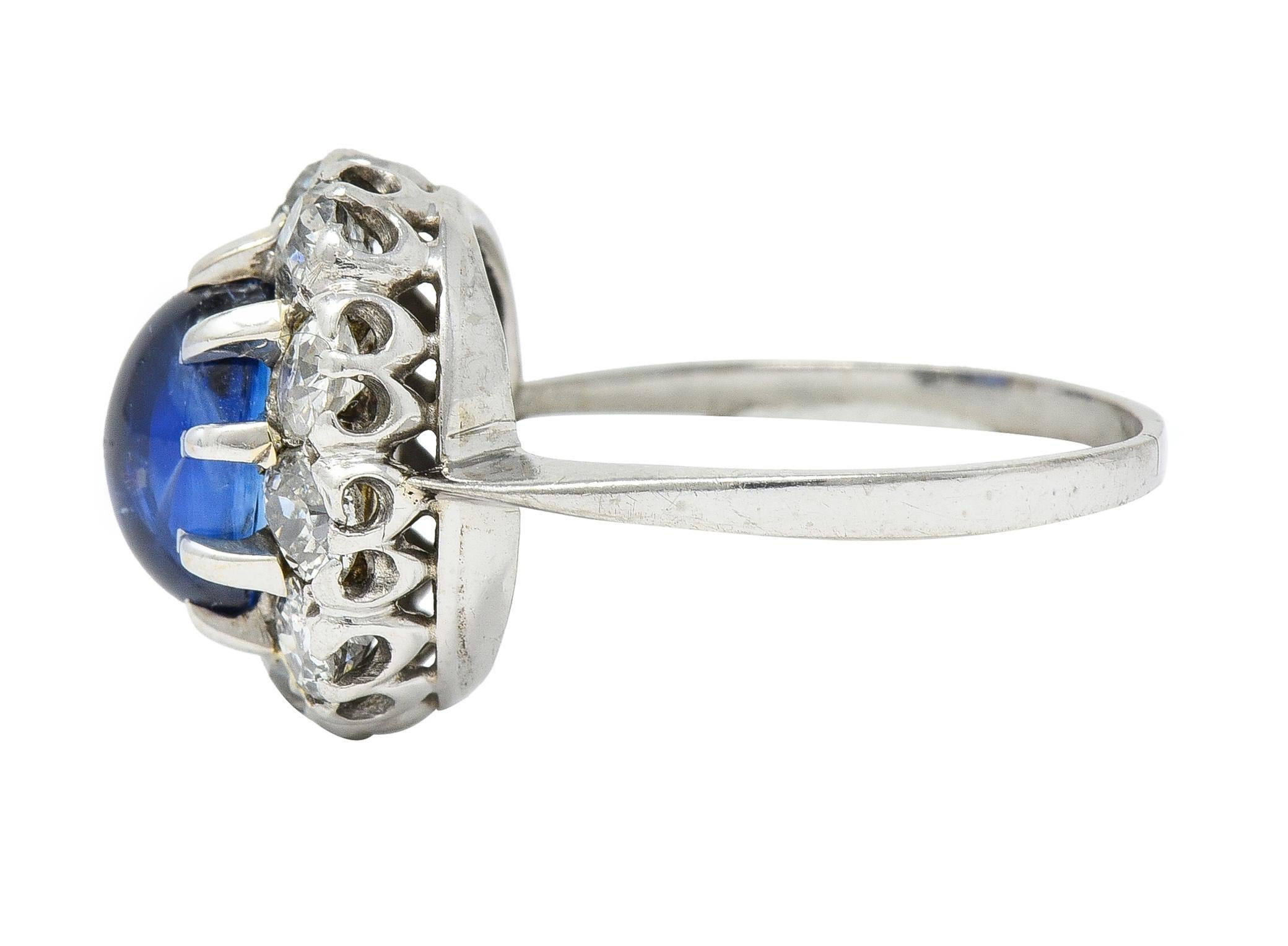 Art Deco 3.52 CTW Sapphire Cabochon Diamond 18 Karat White Gold Halo Ring For Sale 1