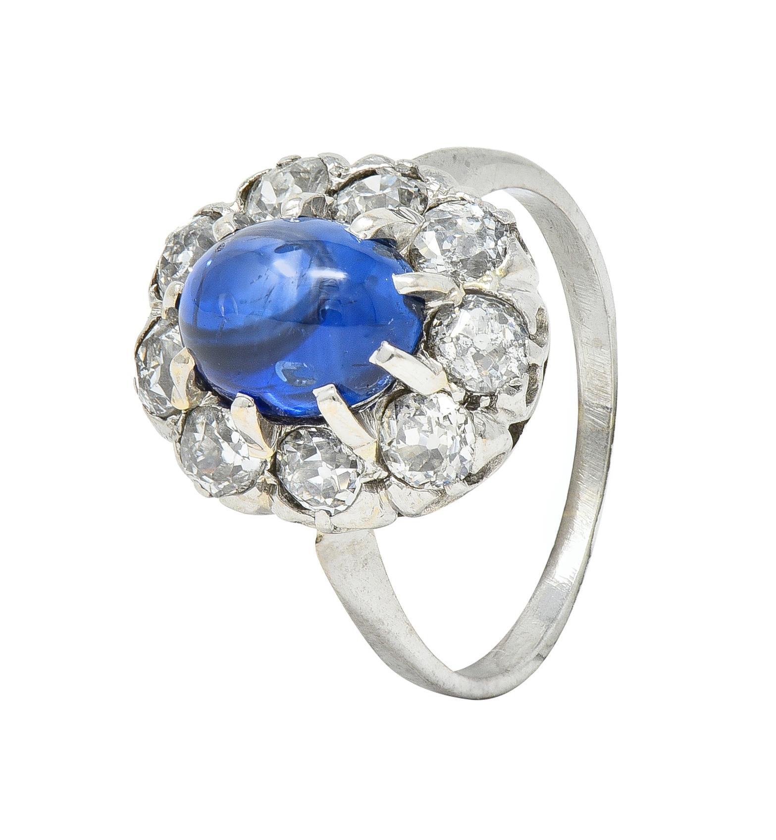 Art Deco 3.52 CTW Sapphire Cabochon Diamond 18 Karat White Gold Halo Ring For Sale 3