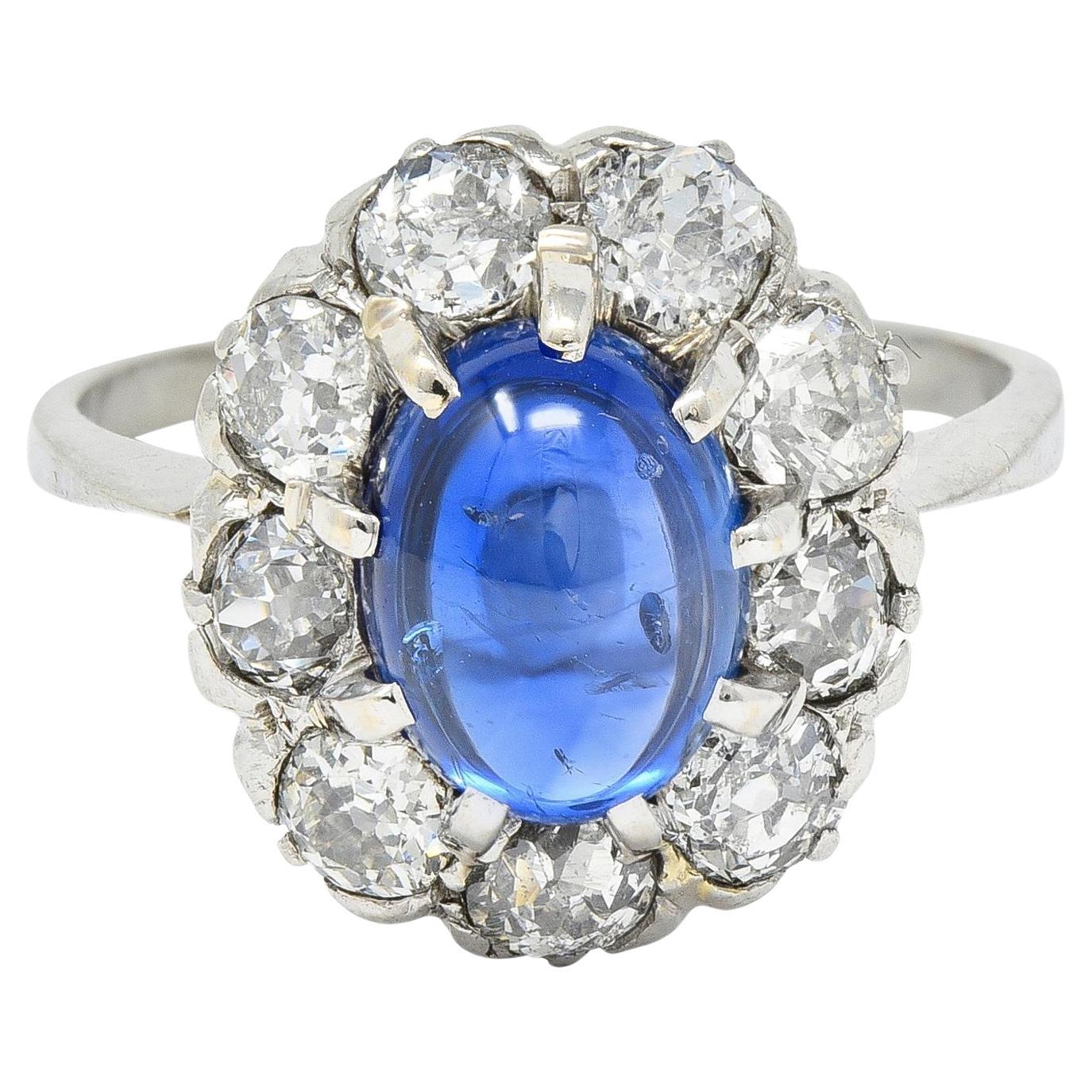 Art Deco 3.52 CTW Sapphire Cabochon Diamond 18 Karat White Gold Halo Ring For Sale