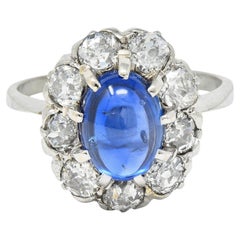 Vintage Art Deco 3.52 CTW Sapphire Cabochon Diamond 18 Karat White Gold Halo Ring