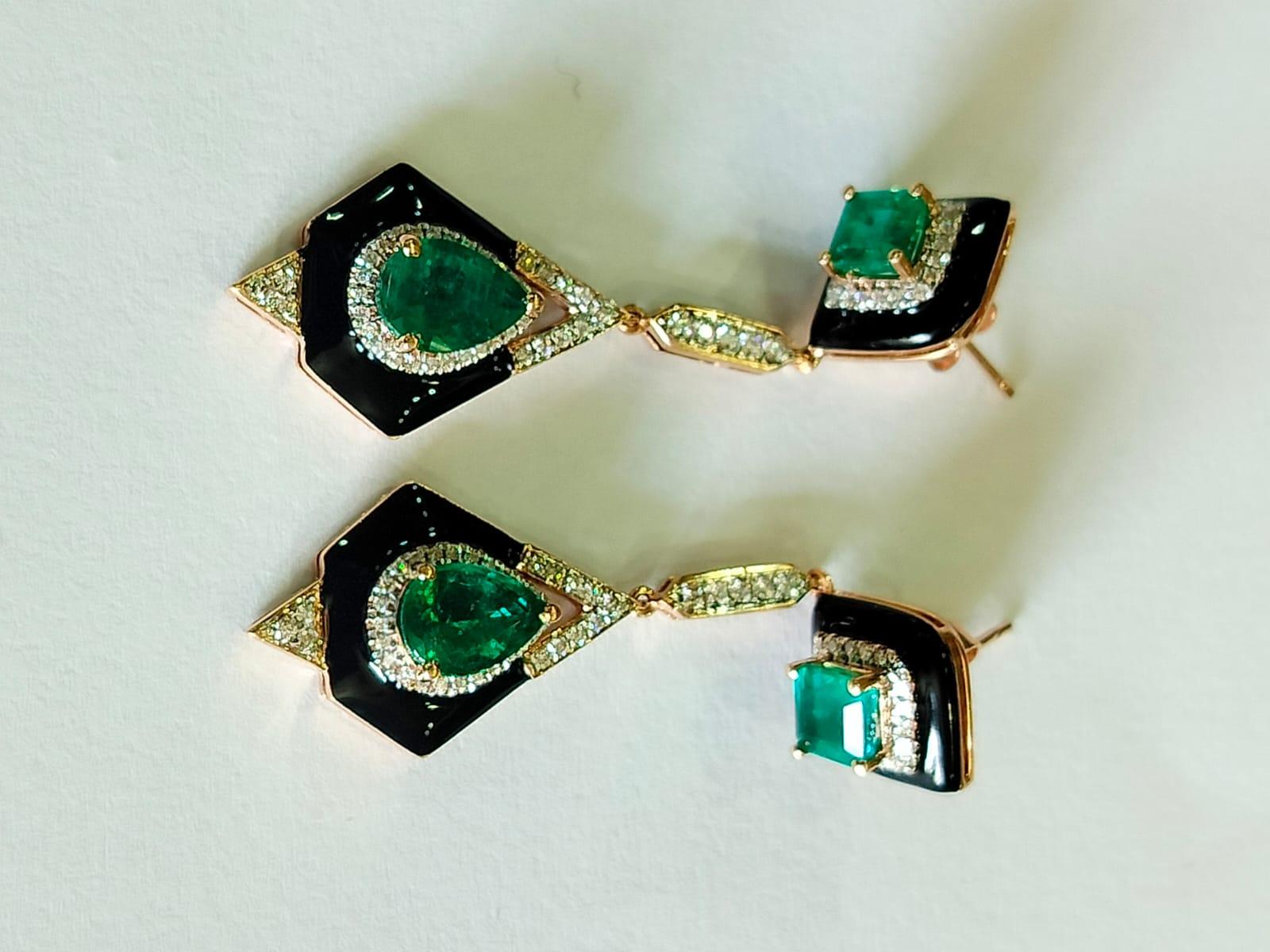 A very gorgeous and beautiful, Art Deco style Emerald Dangle Earrings set in 18K Gold. The weight of the Emeralds is 3.54 carats. The Emeralds are completely natural, without any treatment and is of Zambian origin. The Diamonds weight is 0.47