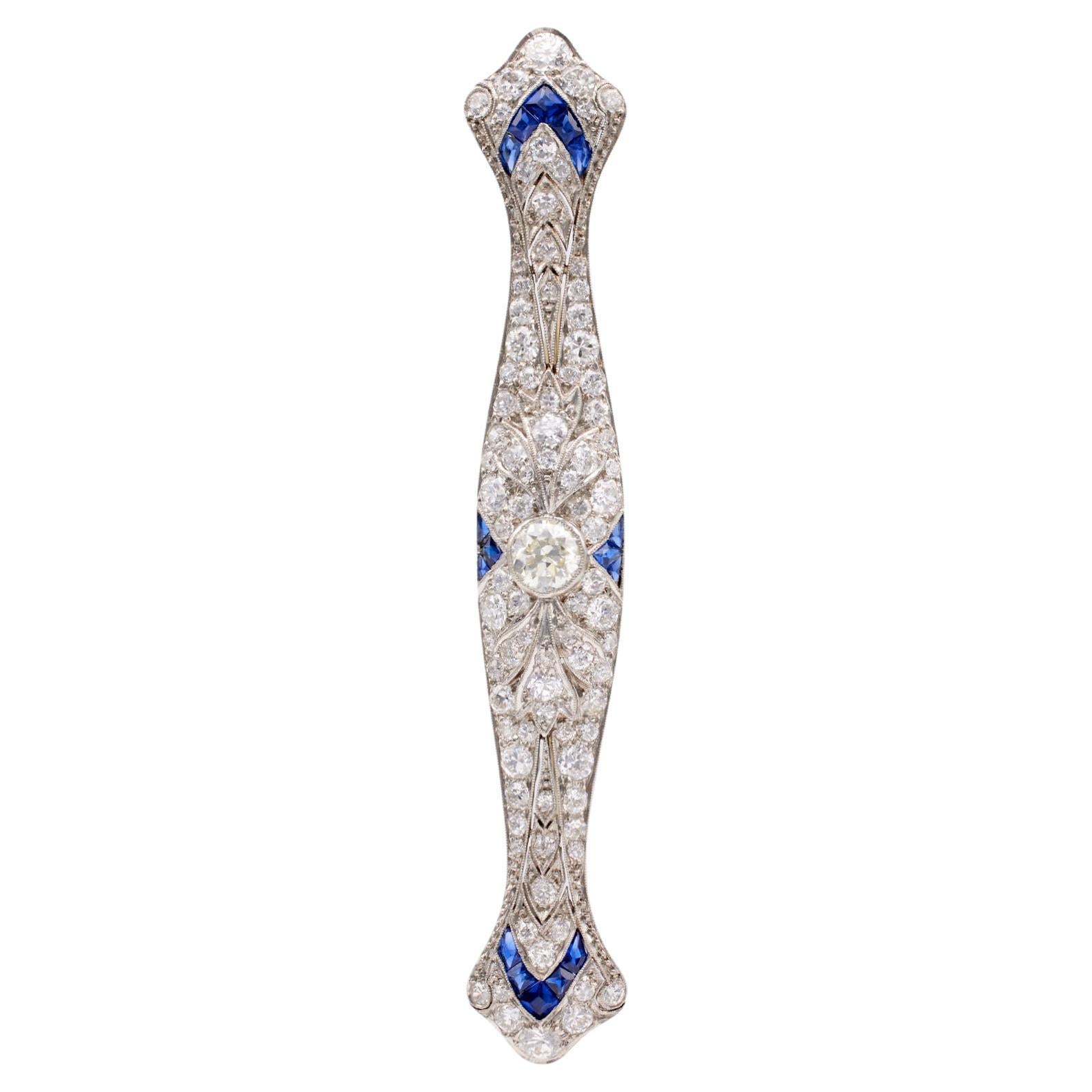 Art Deco 3.80 Carat Total Weight Diamond and Sapphire Platinum Bar Brooch For Sale