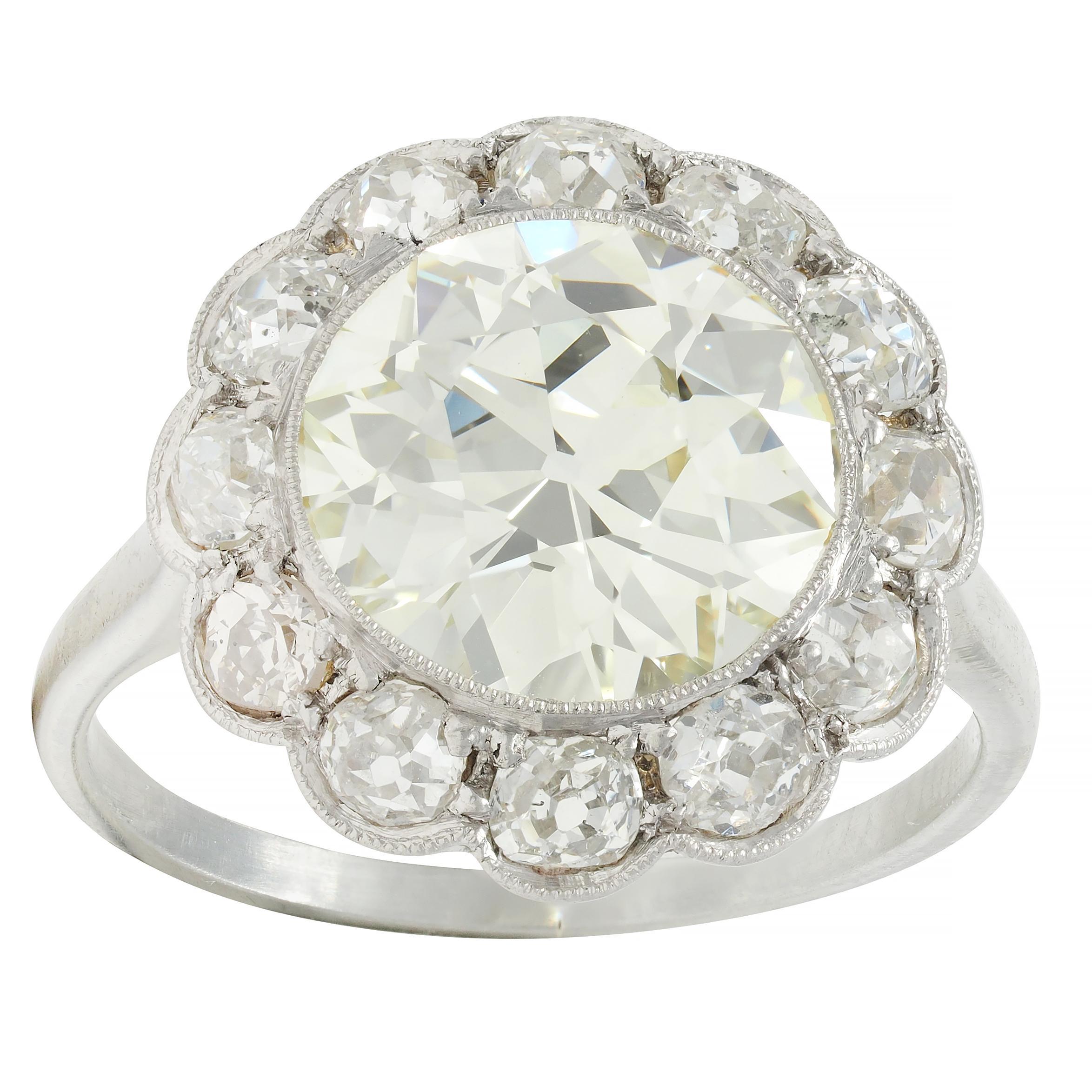 Art Deco 3.99 CTW Old European Cut Diamond 18 Karat White Gold Halo Ring GIA In Excellent Condition For Sale In Philadelphia, PA