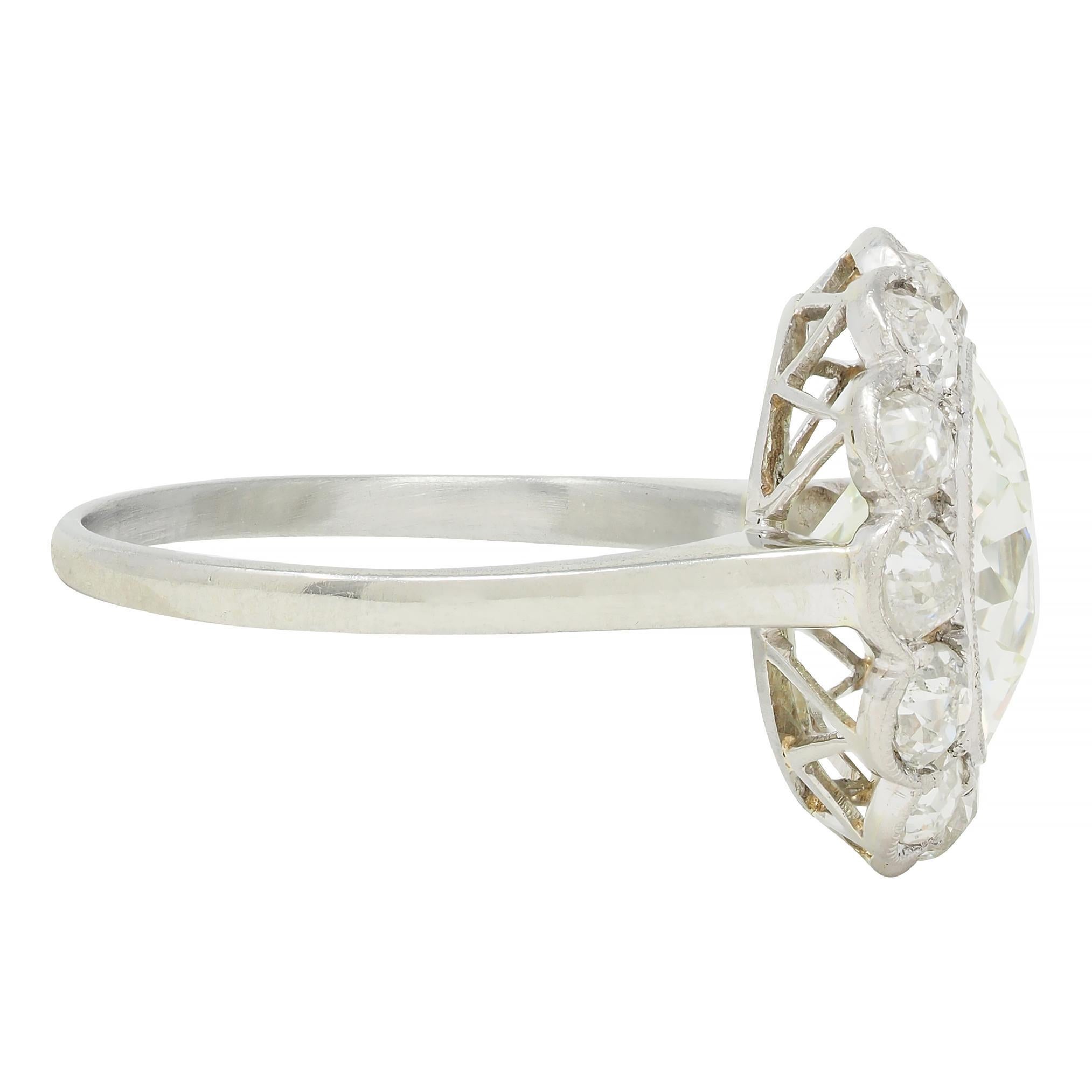 Art Deco 3.99 CTW Old European Cut Diamond 18 Karat White Gold Halo Ring GIA In Excellent Condition For Sale In Philadelphia, PA