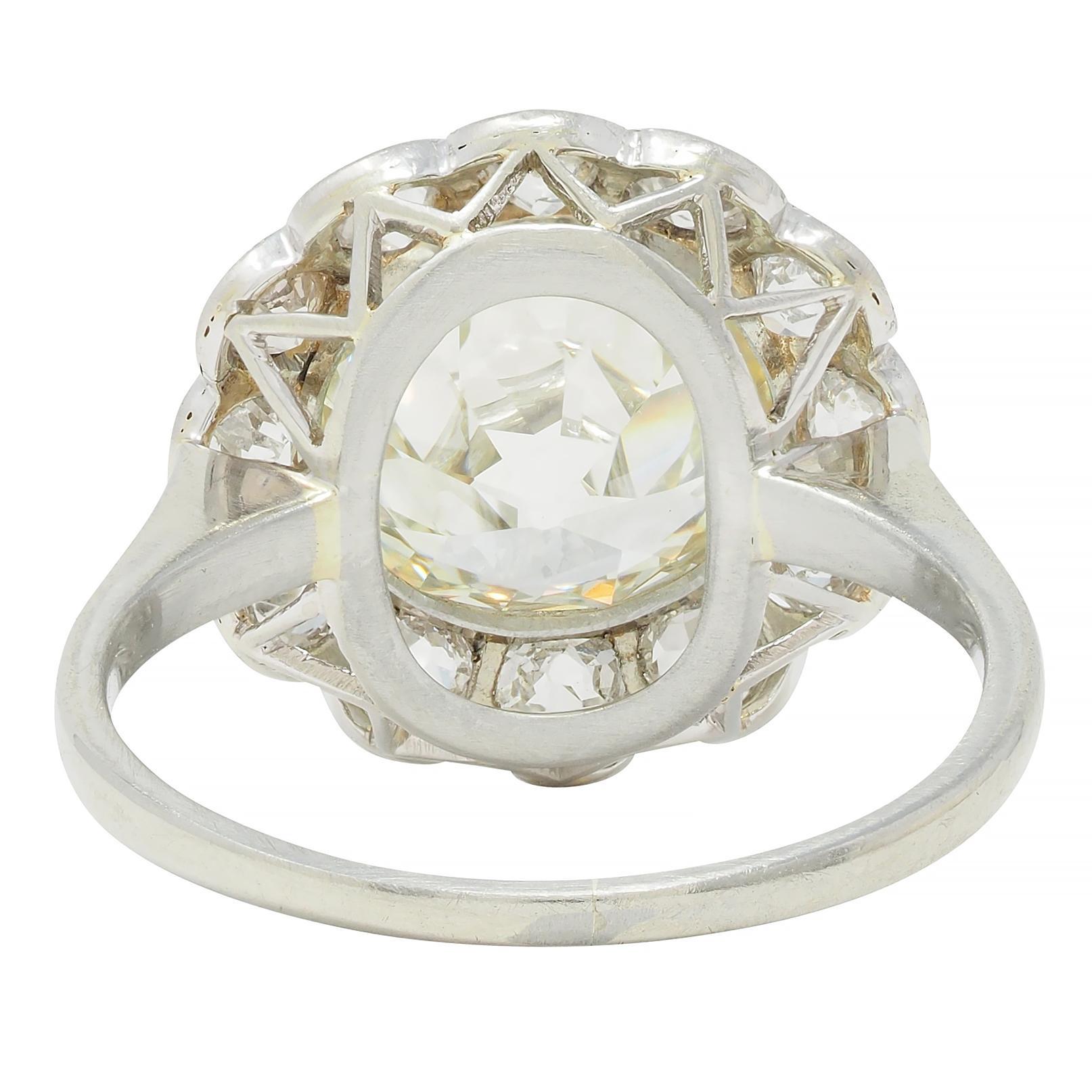 Art Deco 3.99 CTW Old European Cut Diamond 18 Karat White Gold Halo Ring GIA For Sale 1