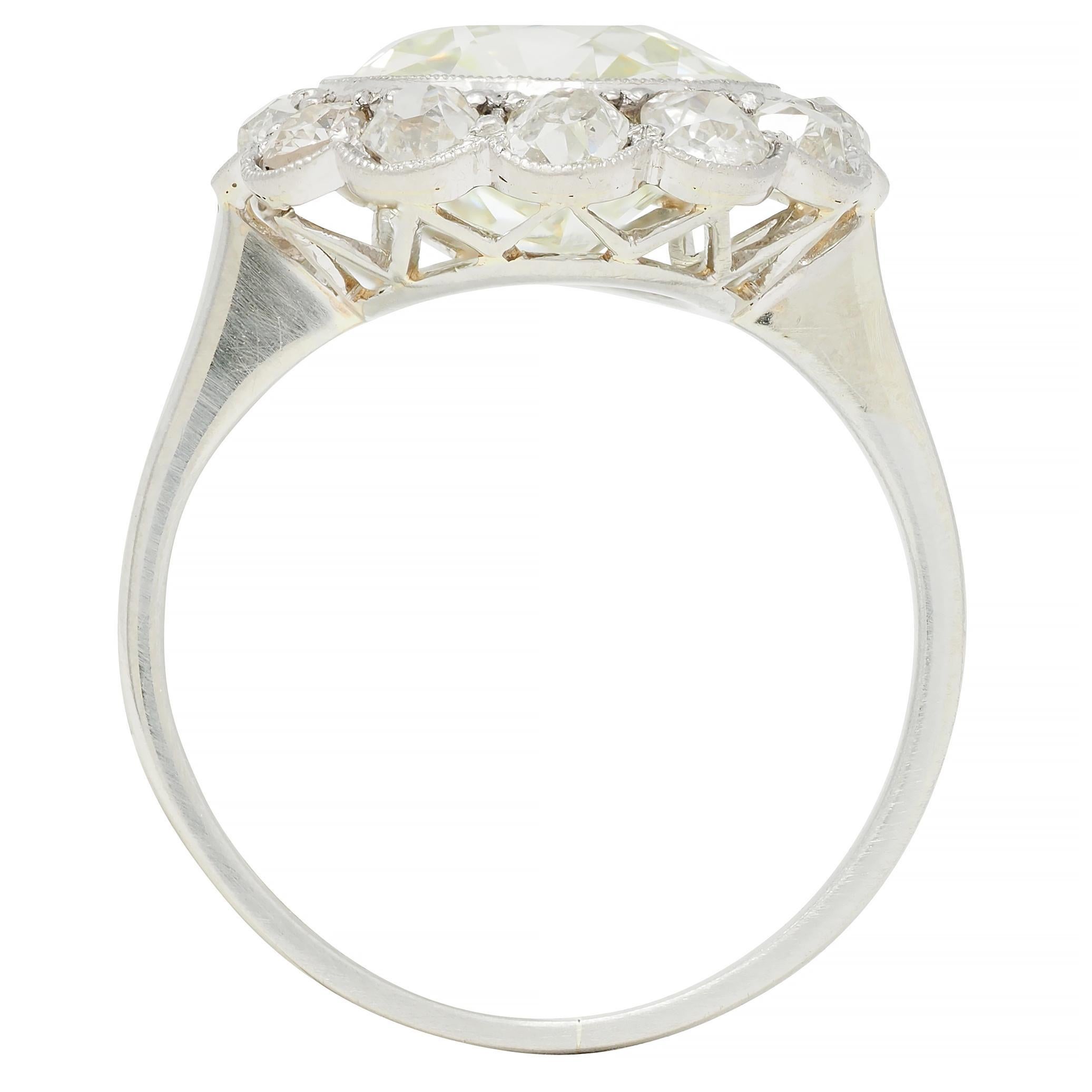 Art Deco 3.99 CTW Old European Cut Diamond 18 Karat White Gold Halo Ring GIA For Sale 5